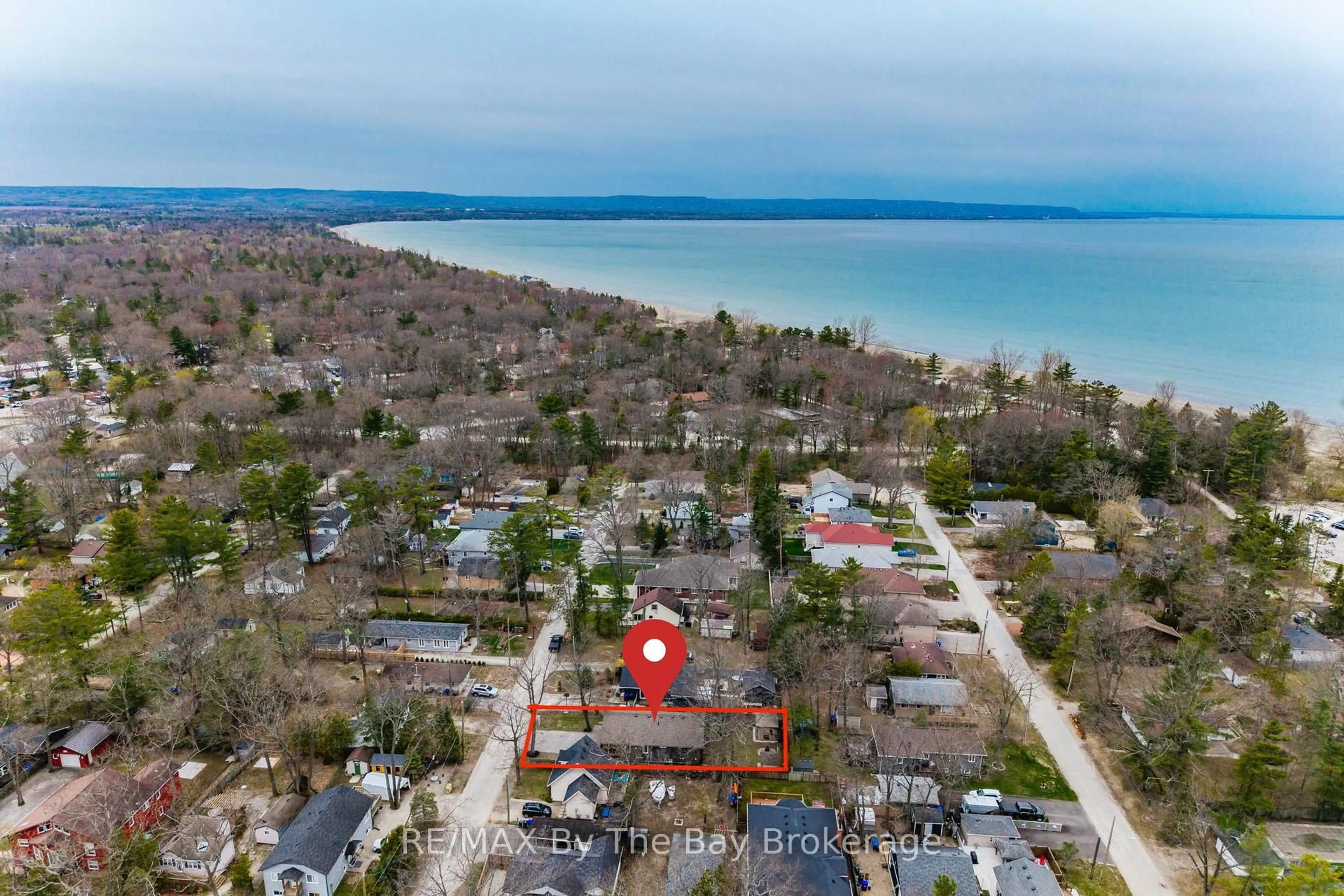 A pic from outside/outdoor area/front of a property/back of a property/a pic from drone, water/lake/river/ocean view for 12 5th Lane, Wasaga Beach Ontario L9Z 2E9