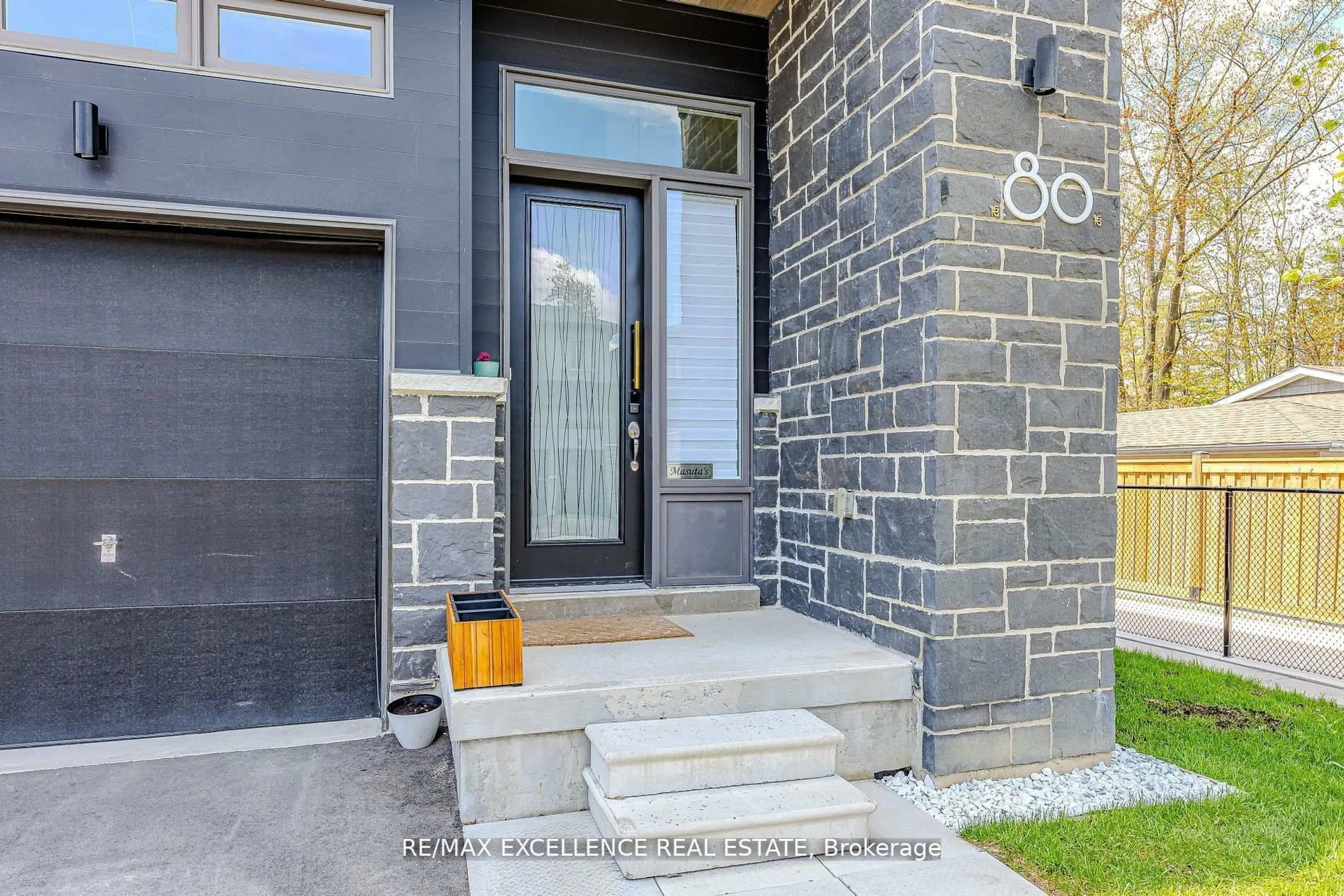 Home with brick exterior material, street for 80 Berkely St, Wasaga Beach Ontario L9Z 0K5