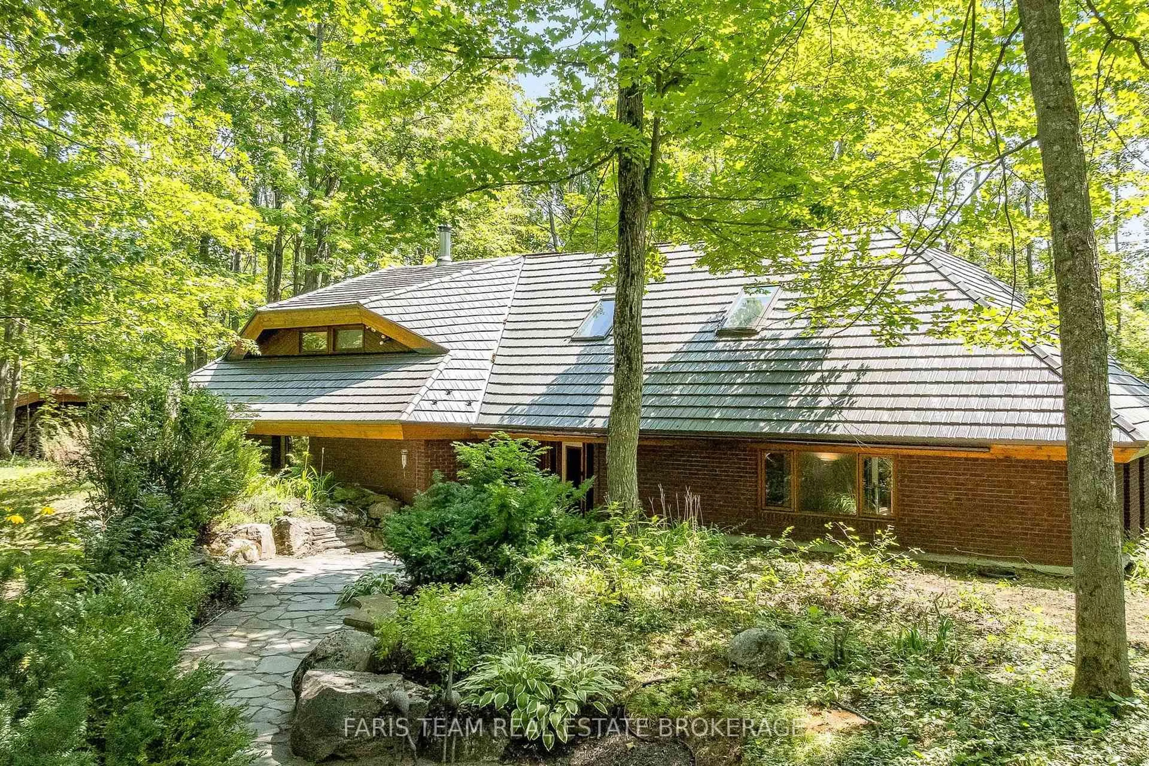 A pic from outside/outdoor area/front of a property/back of a property/a pic from drone, forest/trees view for 15 Scottdale Dr, Oro-Medonte Ontario L0L 1T0