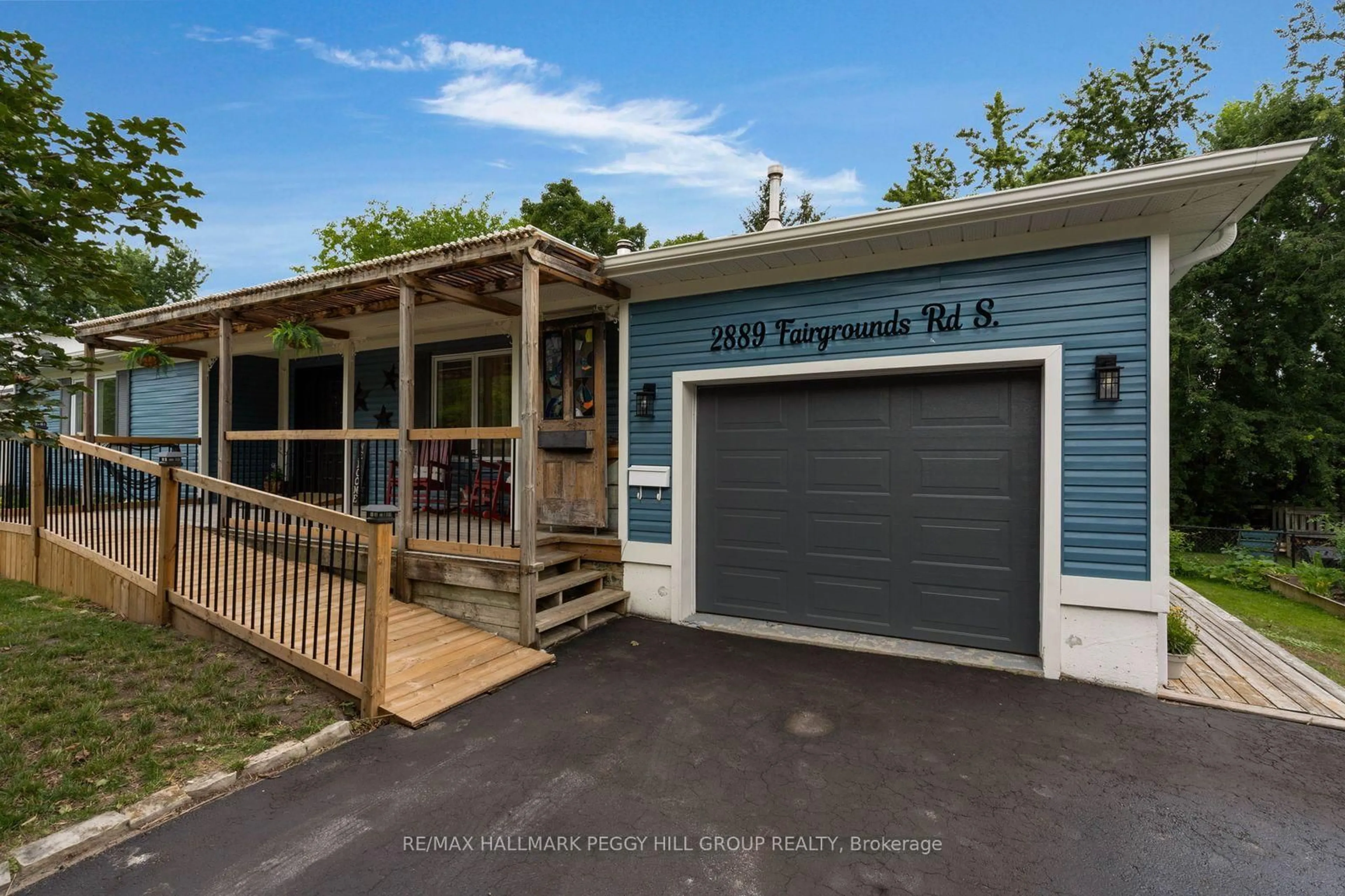 A pic from outside/outdoor area/front of a property/back of a property/a pic from drone, street for 2889 Fairgrounds Rd, Clearview Ontario L0M 1G0