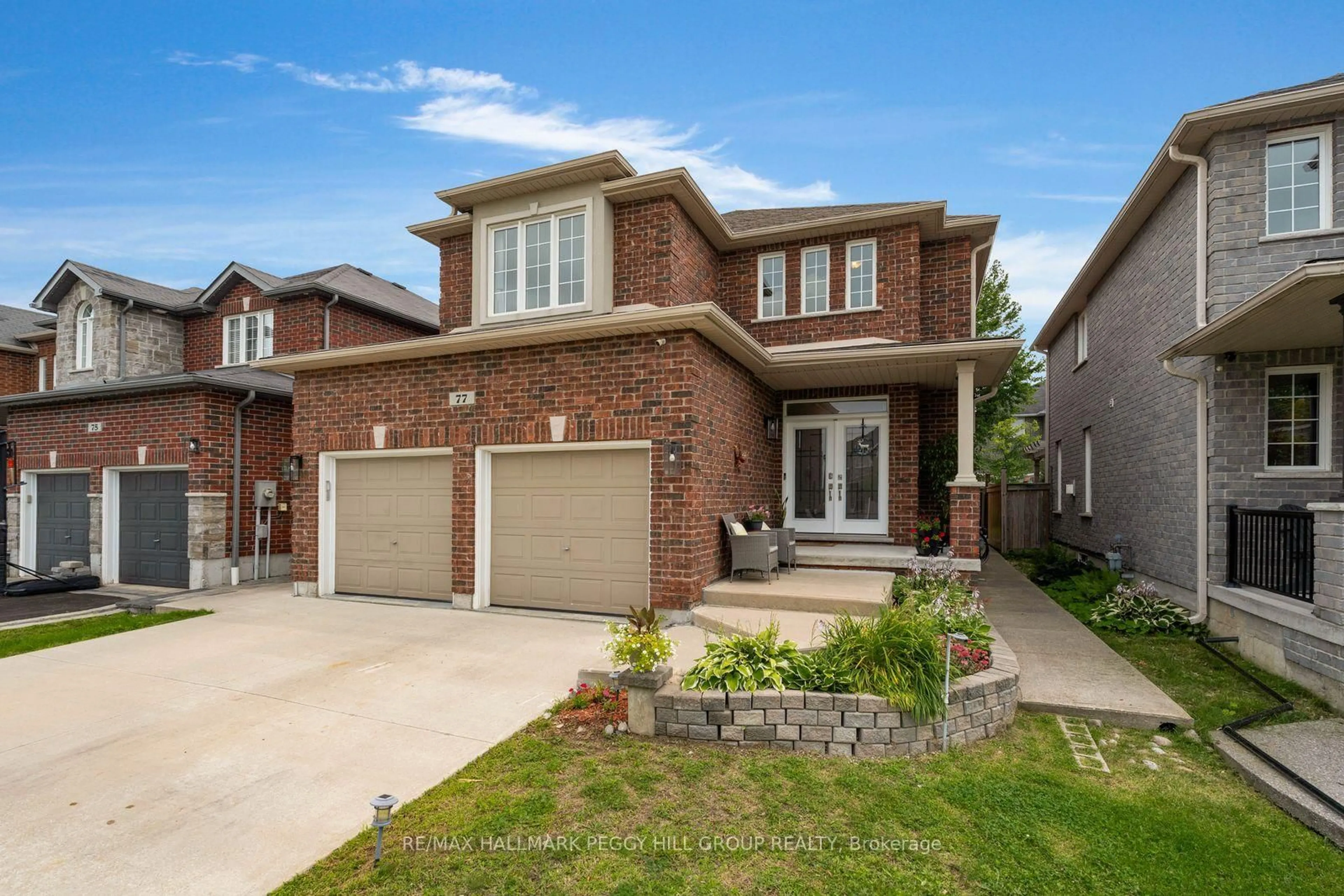 Home with brick exterior material, street for 77 Graihawk Dr, Barrie Ontario L4N 6G7