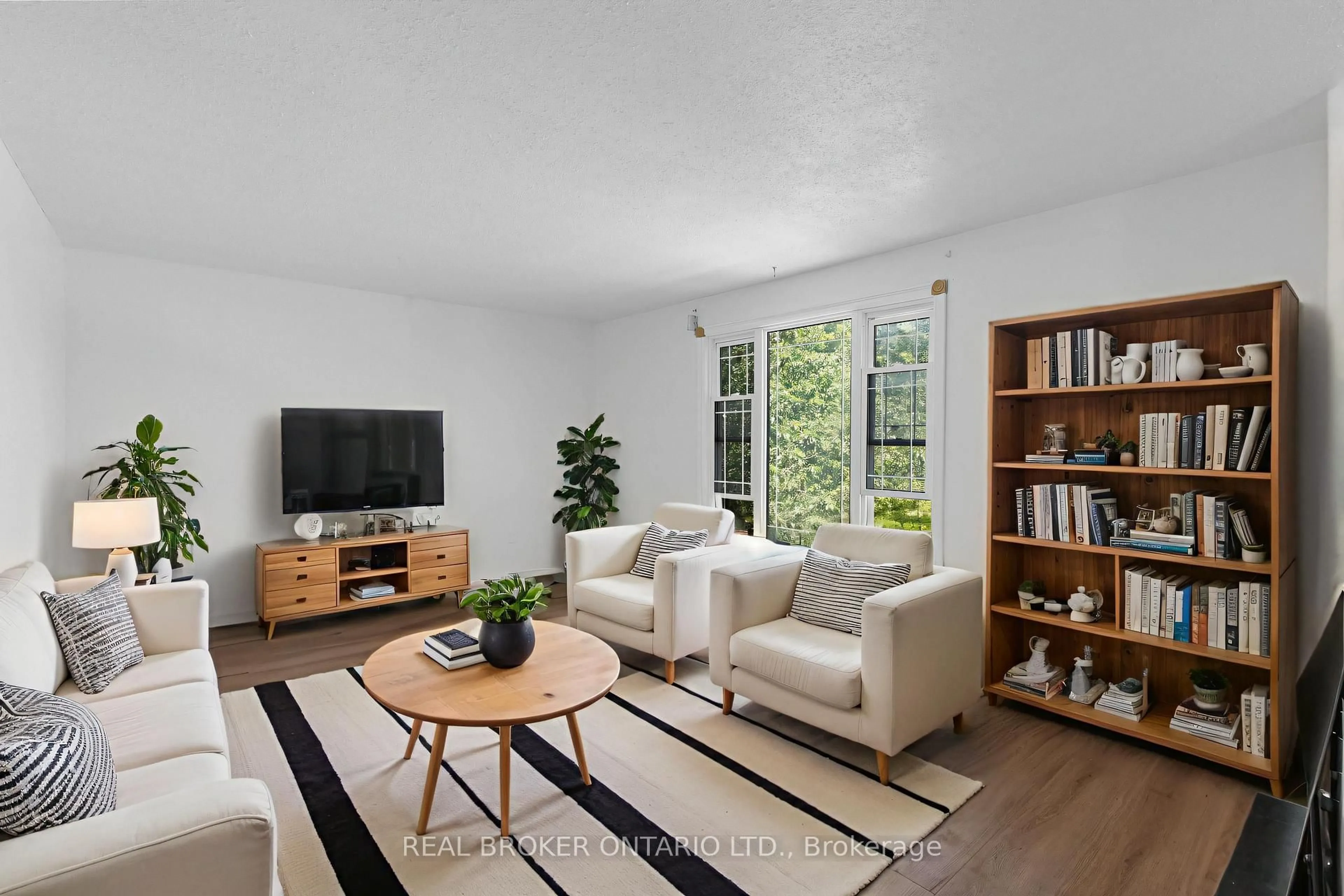 Living room with furniture, unknown for 57 Bernick Dr, Barrie Ontario L4M 5C1