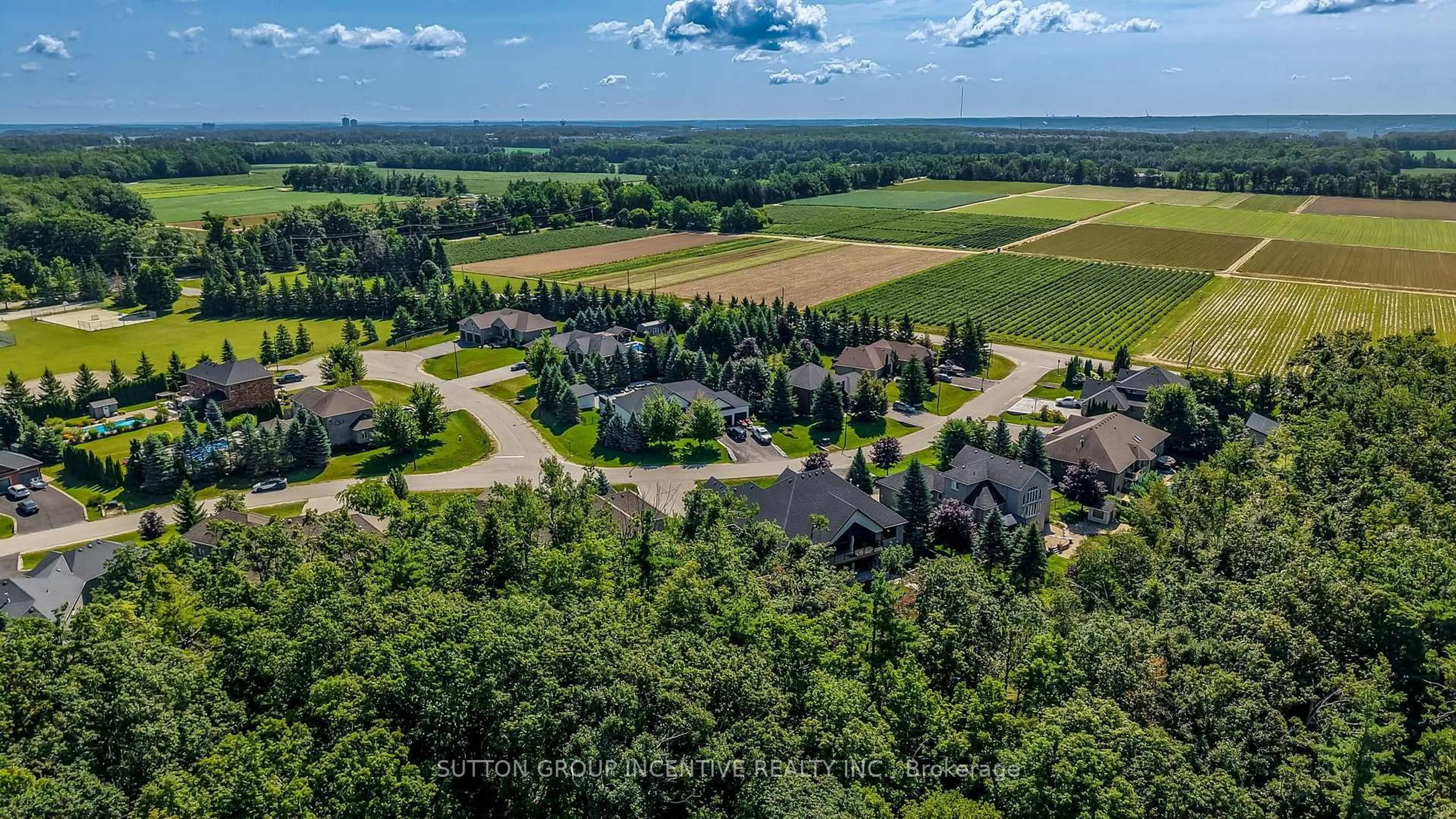 A pic from outside/outdoor area/front of a property/back of a property/a pic from drone, unknown for 18 Lloyd Cook Dr, Springwater Ontario L4M 4S4
