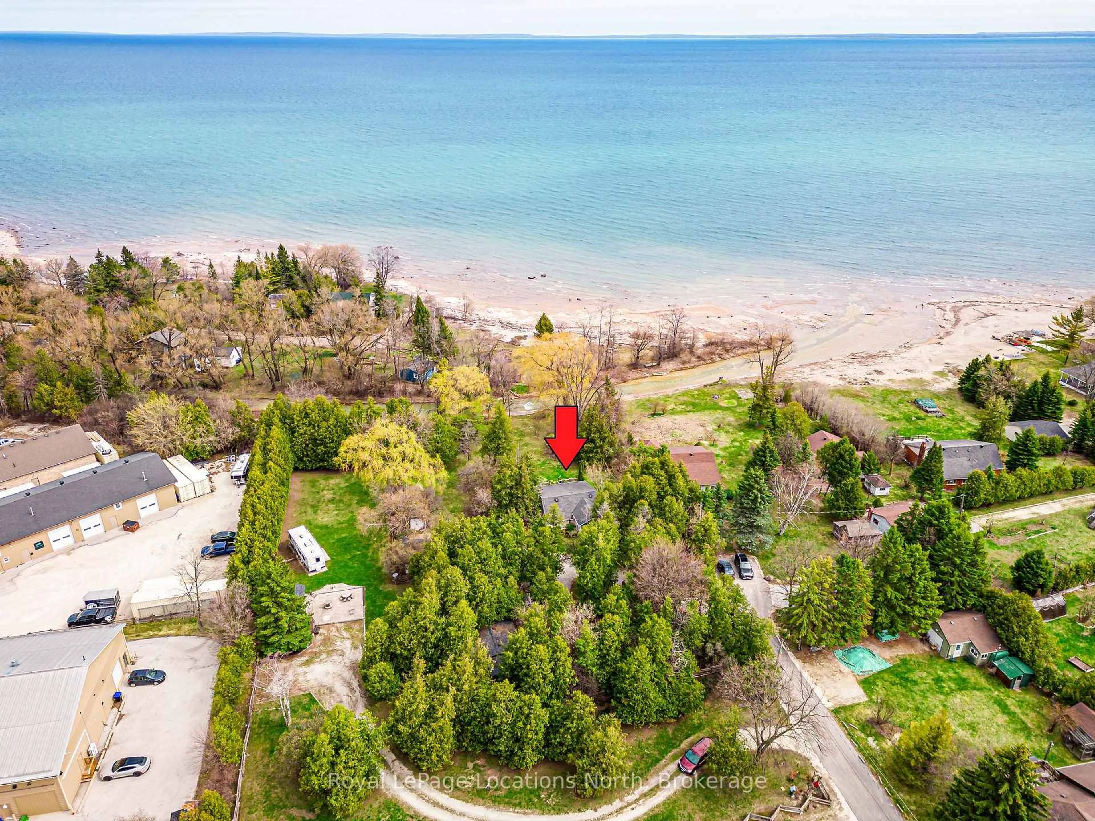 A pic from outside/outdoor area/front of a property/back of a property/a pic from drone, water/lake/river/ocean view for 21 Eva Cres, Collingwood Ontario L9Y 5R1