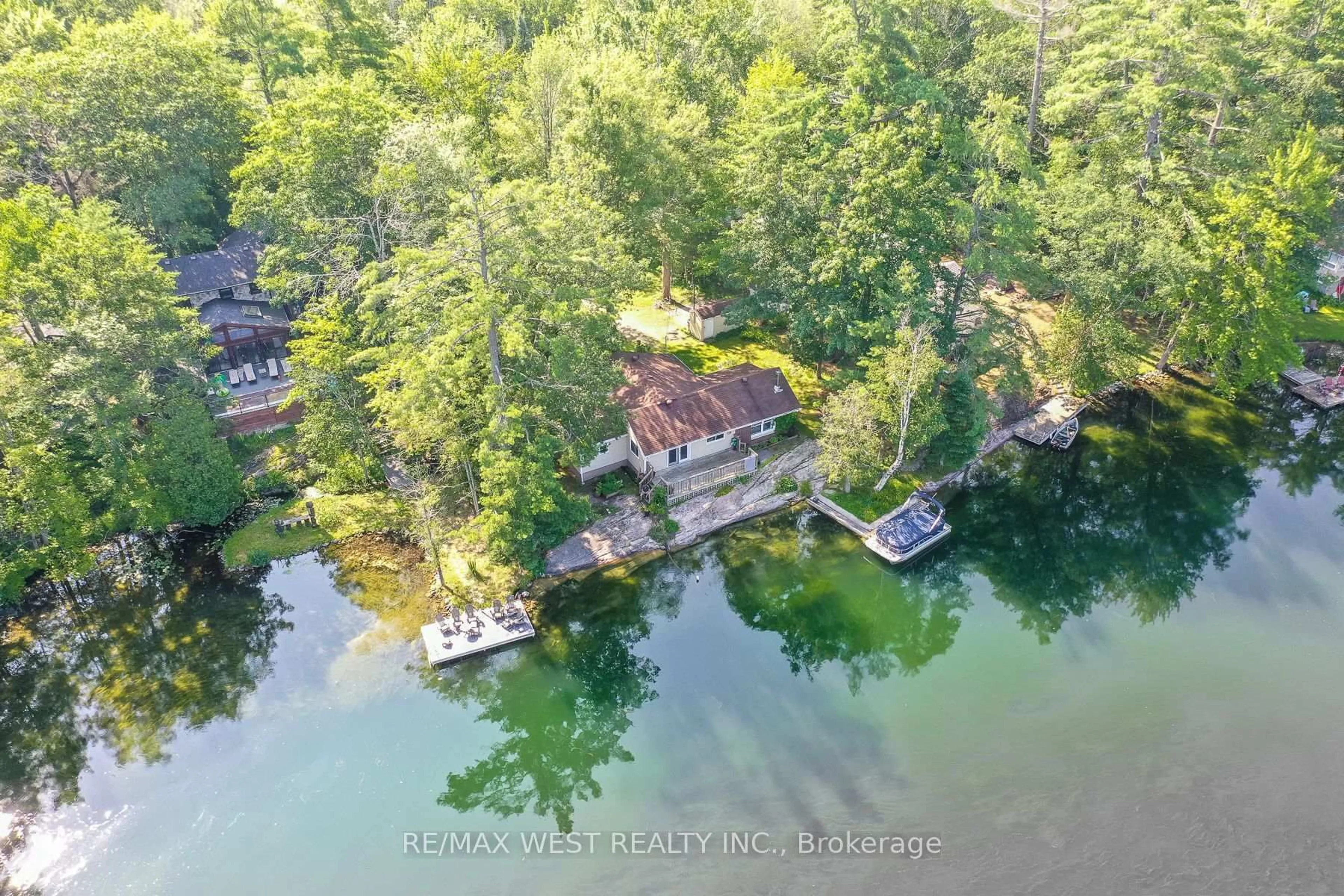 A pic from outside/outdoor area/front of a property/back of a property/a pic from drone, water/lake/river/ocean view for 8060 Oakridge Dr, Ramara Ontario L0K 2B0
