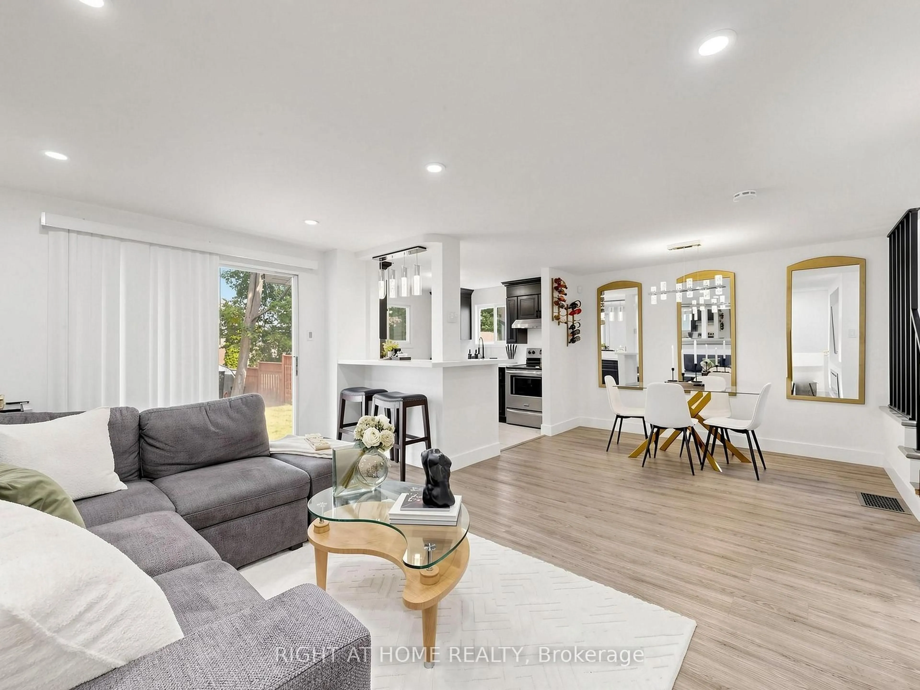 Living room with furniture, unknown for 207 Hickling Tr, Barrie Ontario L4M 5W6