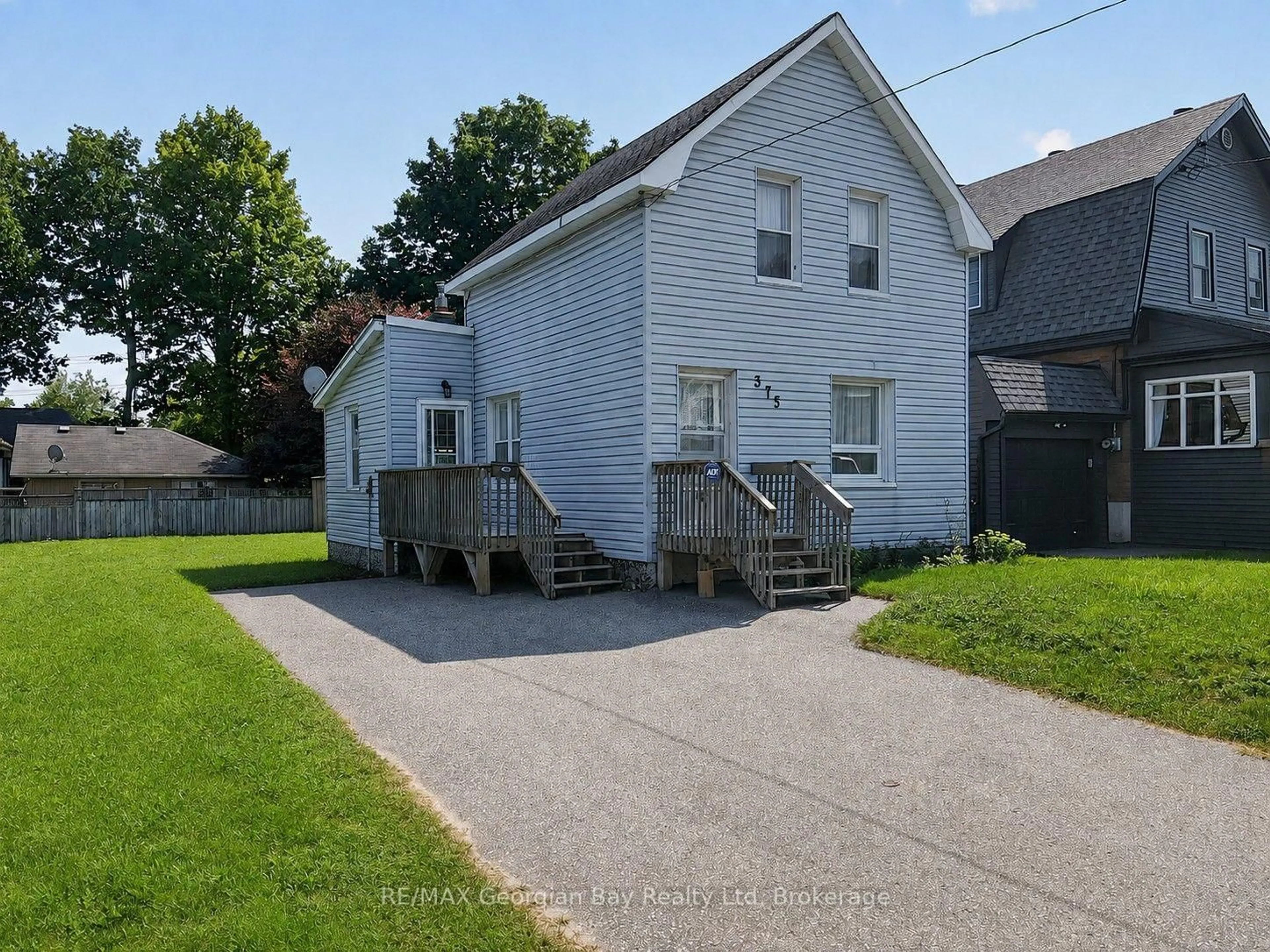 A pic from outside/outdoor area/front of a property/back of a property/a pic from drone, street for 375 Horrell Ave, Midland Ontario L4R 2A5