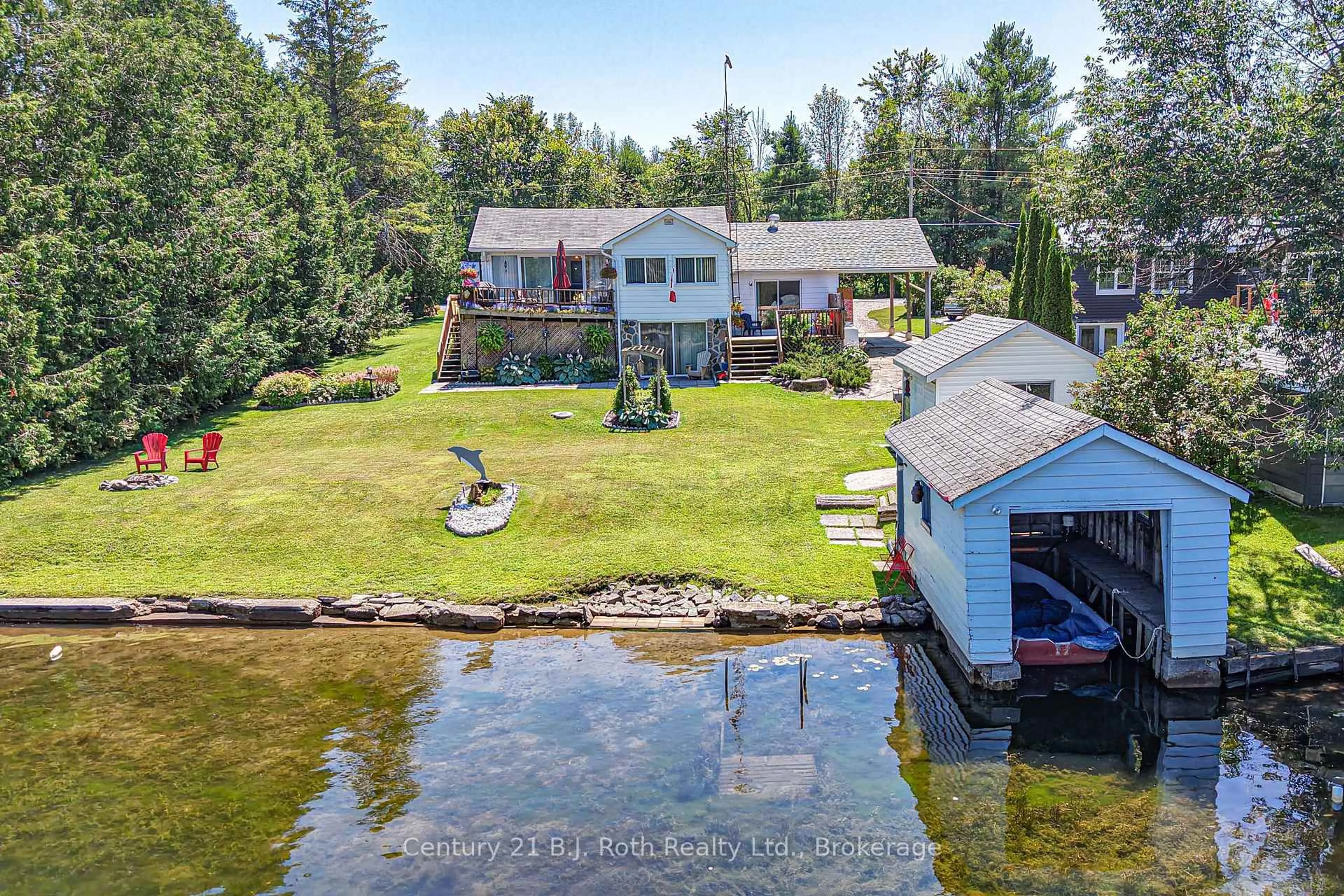A pic from outside/outdoor area/front of a property/back of a property/a pic from drone, water/lake/river/ocean view for 4202 Canal Rd, Severn Ontario L0K 2B0