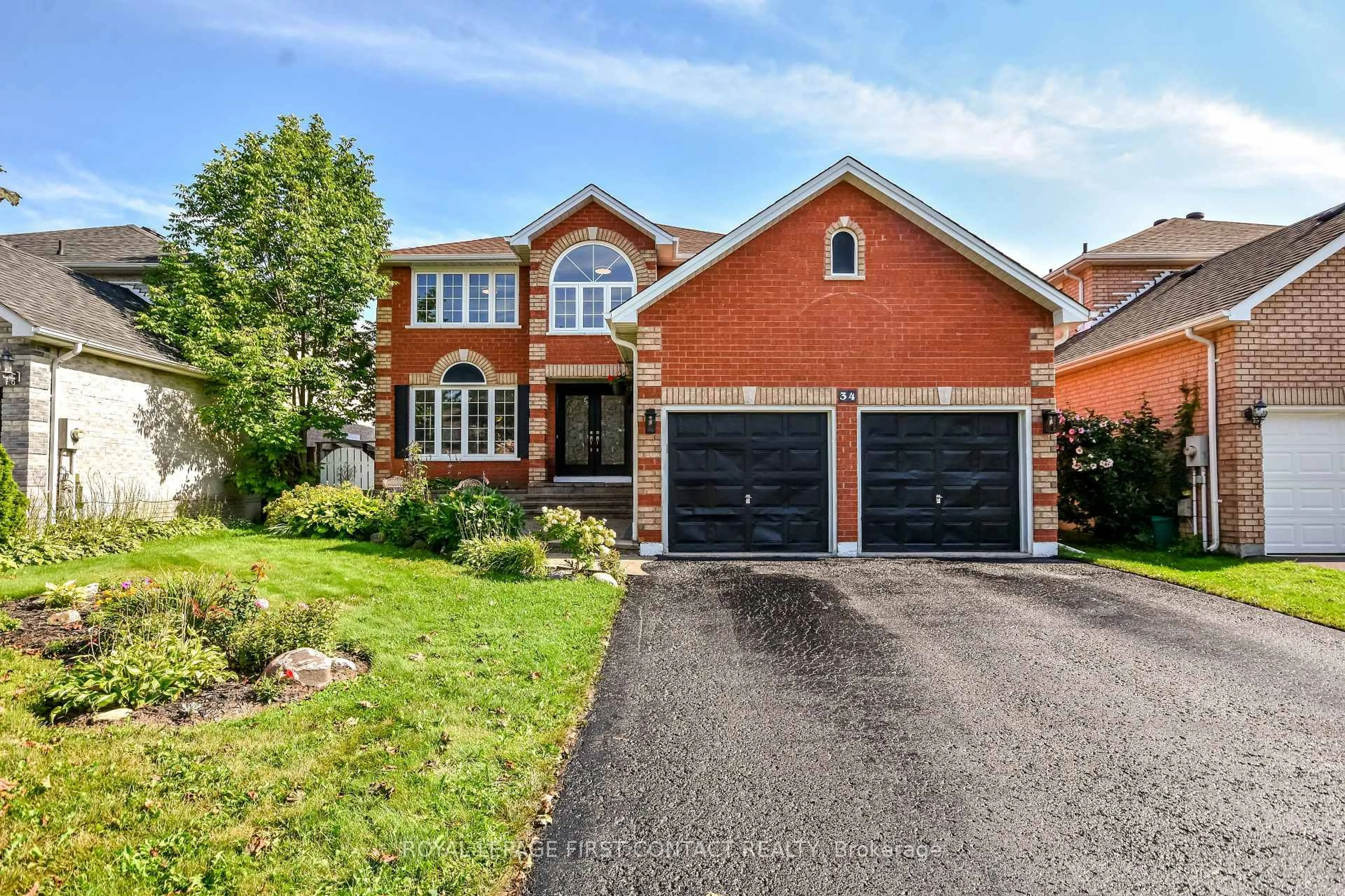 Home with brick exterior material, street for 34 Bear Creek Dr, Barrie Ontario L4N 9M6
