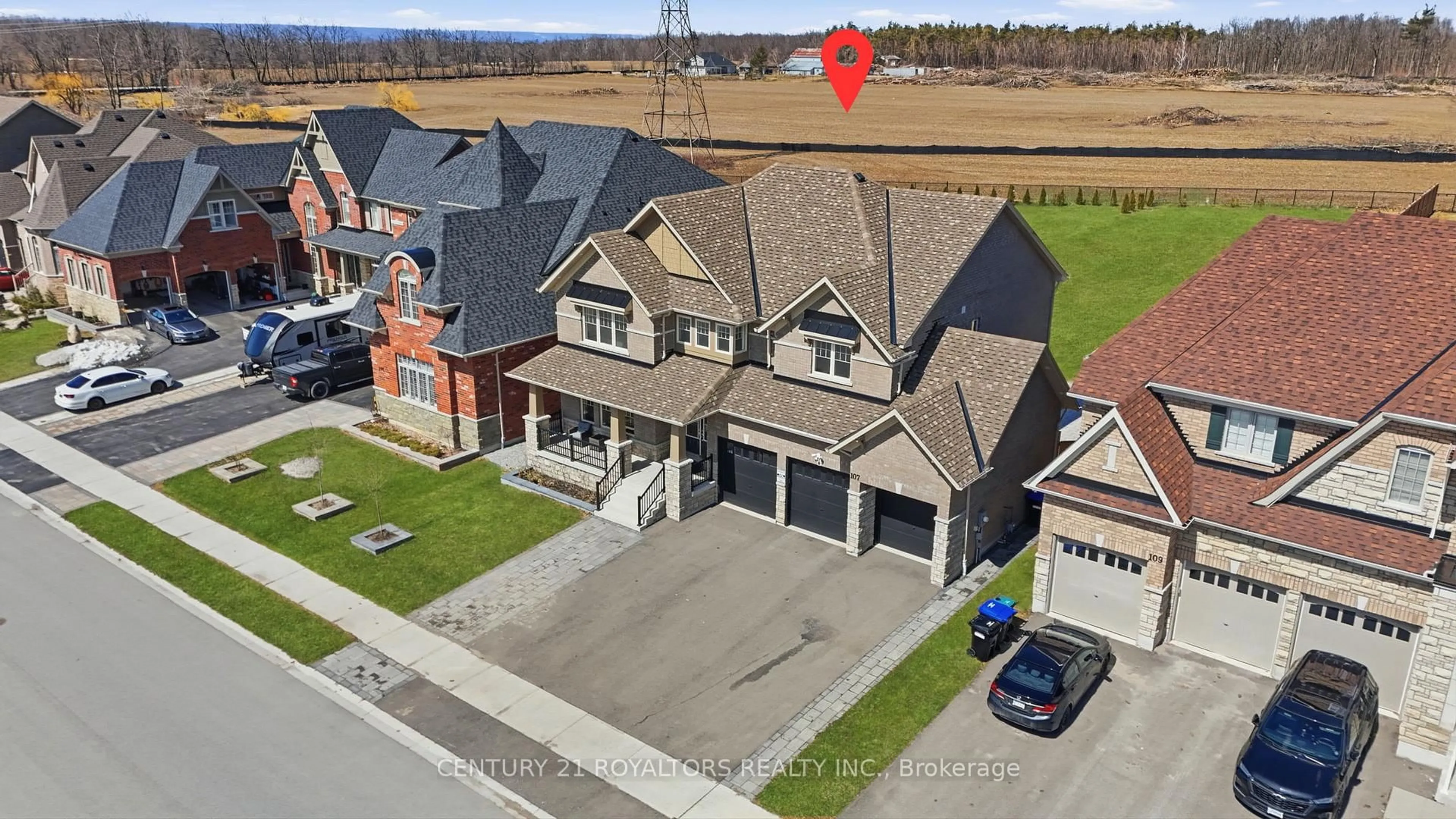 A pic from outside/outdoor area/front of a property/back of a property/a pic from drone, street for 107 Rugman Cres, Springwater Ontario L9X 2A5