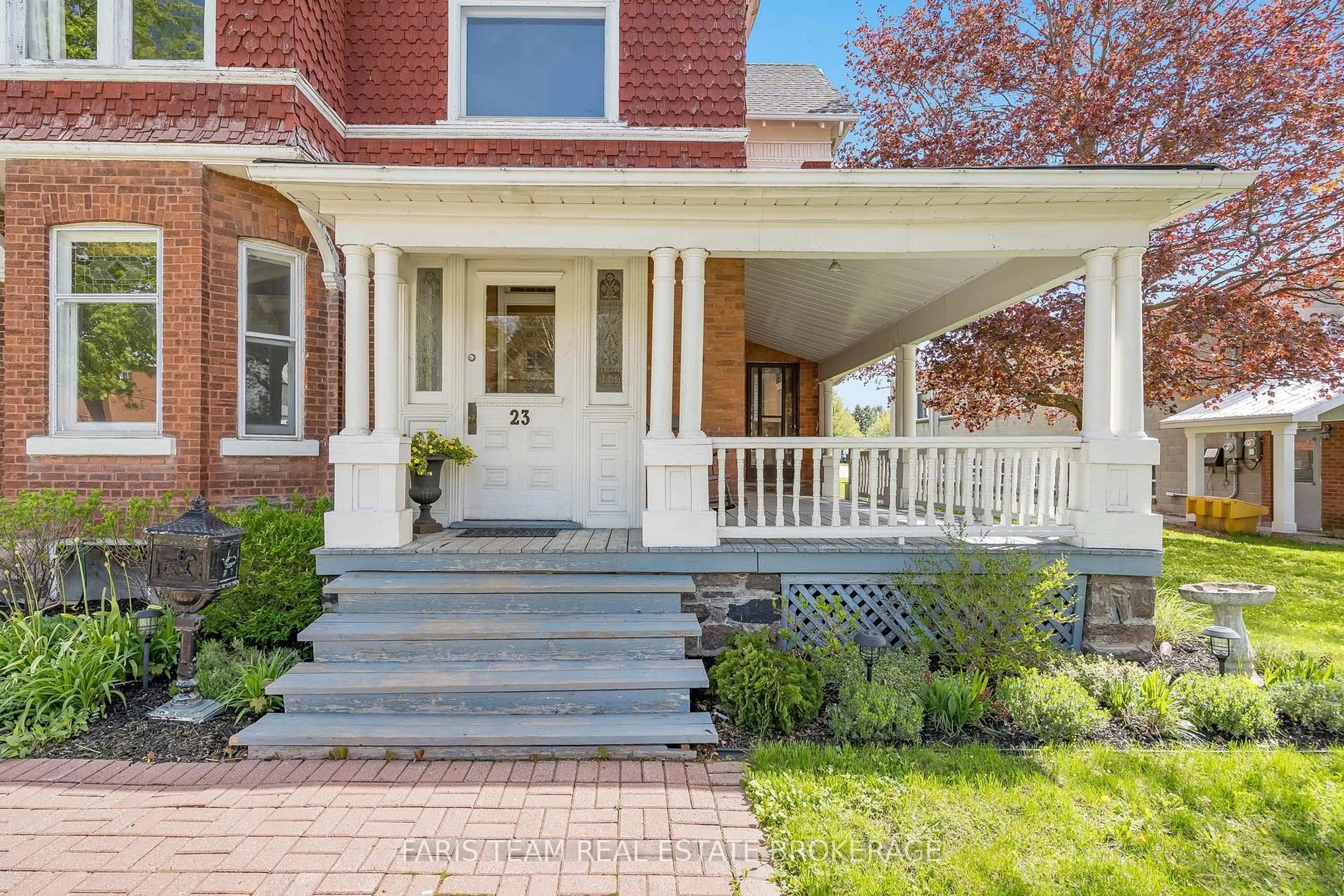 Home with brick exterior material, street for 23 Yonge St, Springwater Ontario L0L 1P0