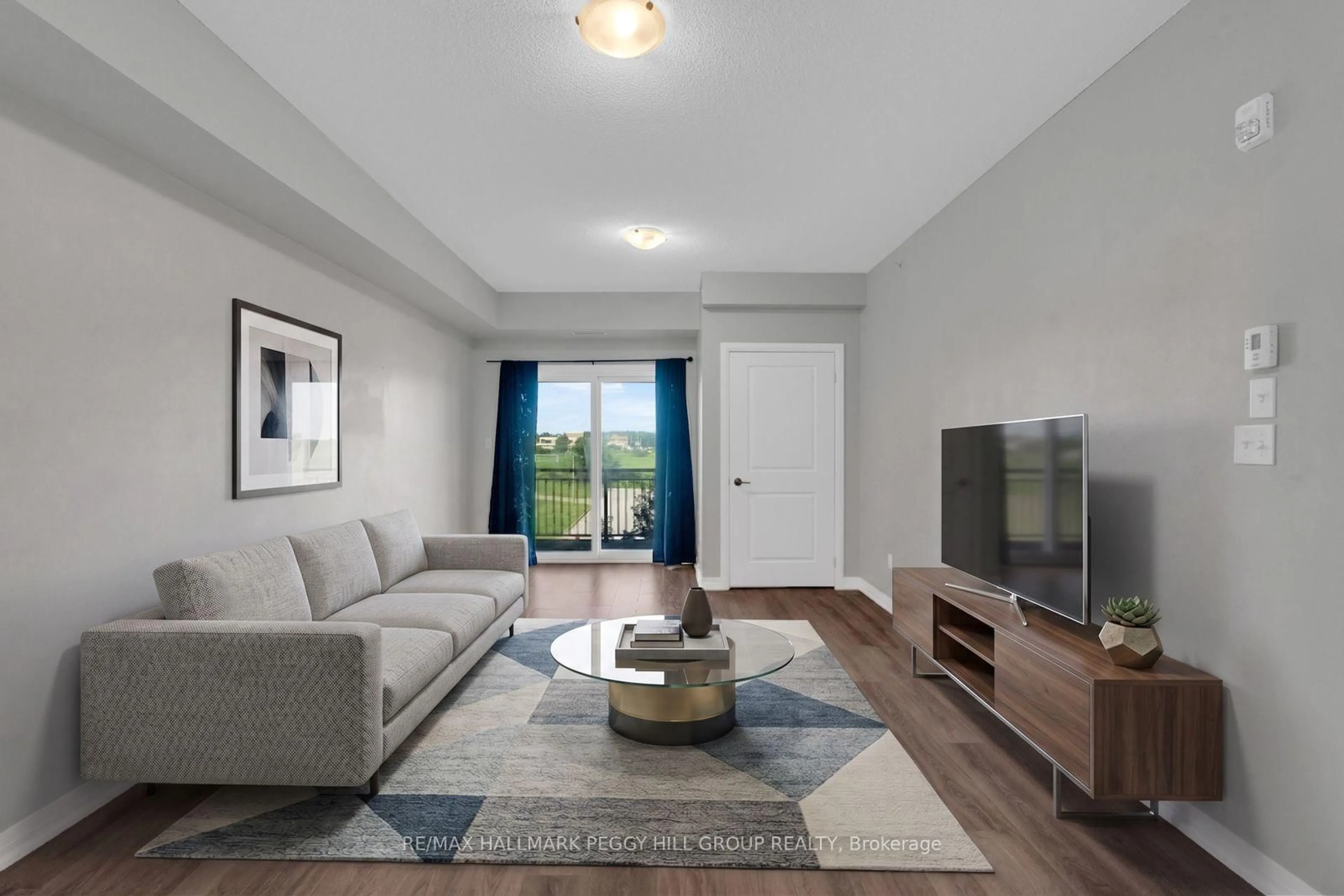 Living room with furniture, unknown for 299 Cundles Rd #308, Barrie Ontario L4M 0K9