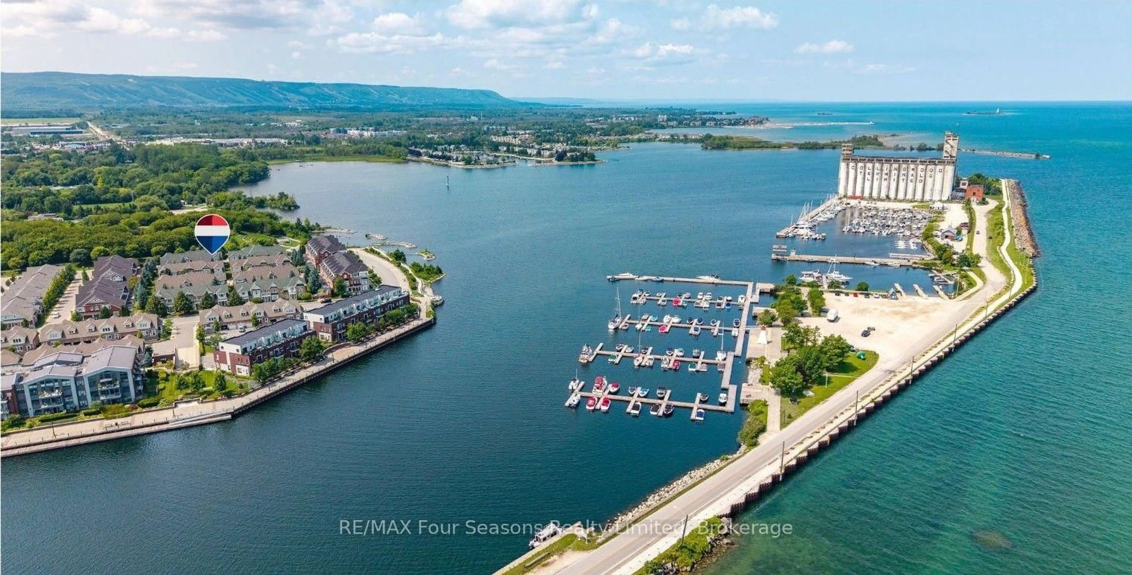 A pic from outside/outdoor area/front of a property/back of a property/a pic from drone, water/lake/river/ocean view for 9 North Maple St, Collingwood Ontario L9Y 0J7