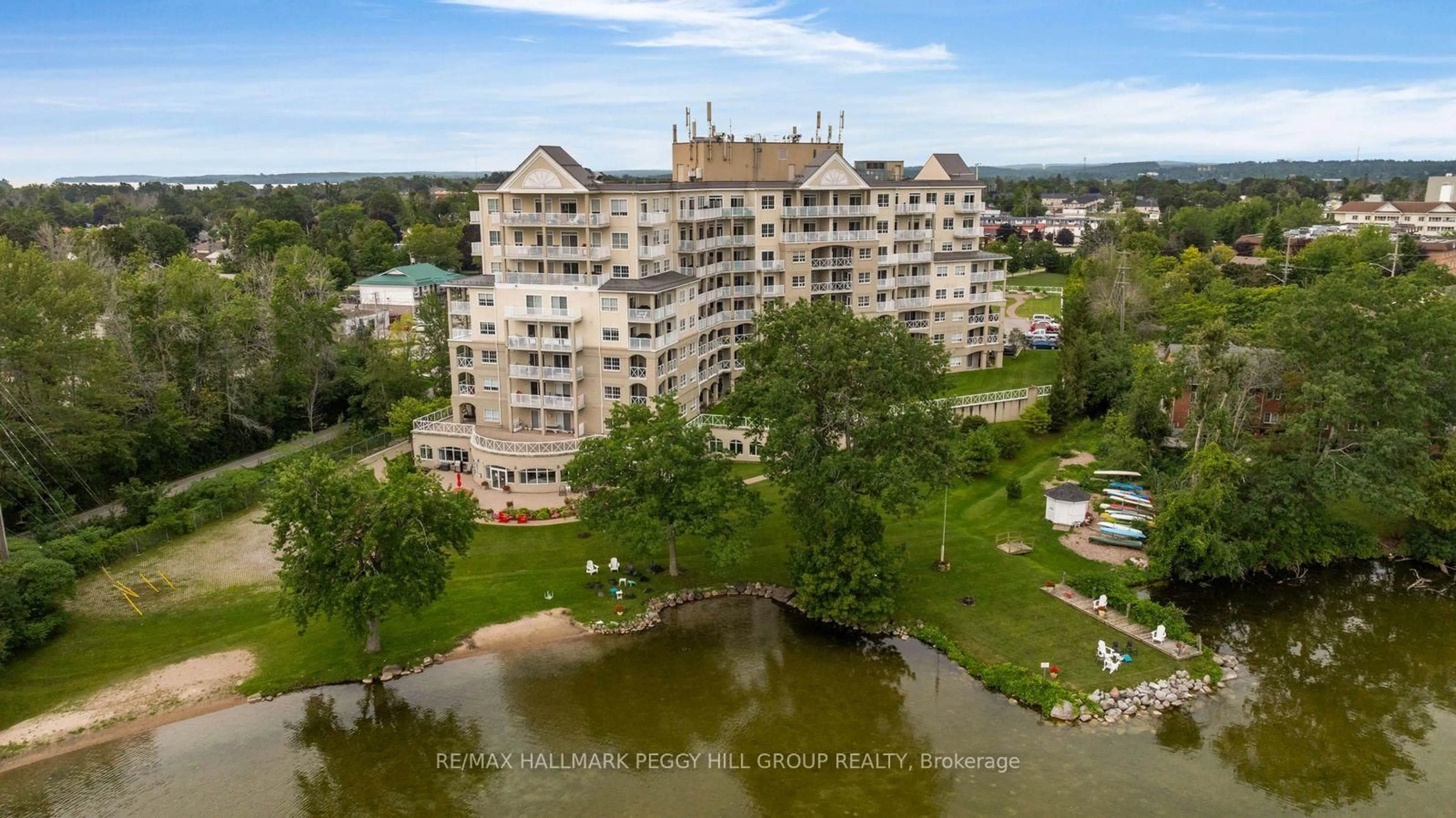 A pic from outside/outdoor area/front of a property/back of a property/a pic from drone, water/lake/river/ocean view for 354 Atherley Rd #406, Orillia Ontario L3V 0B8
