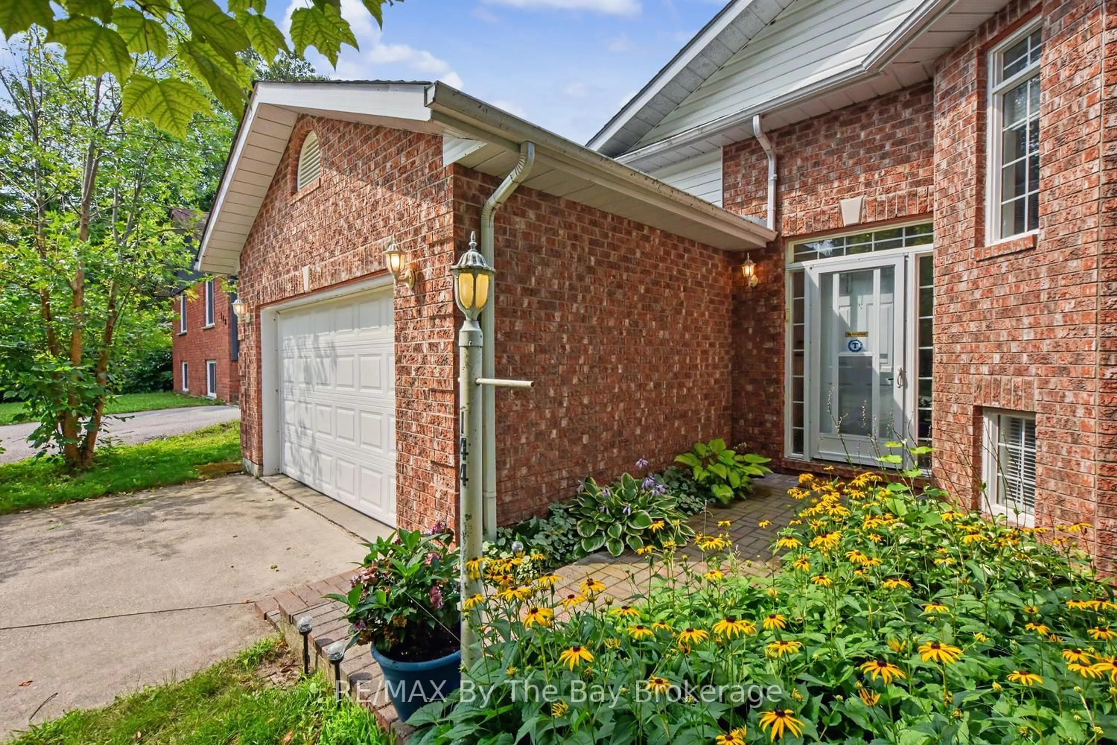 Home with brick exterior material, street for 144 SMALLMAN Dr, Wasaga Beach Ontario L9Z 1L3