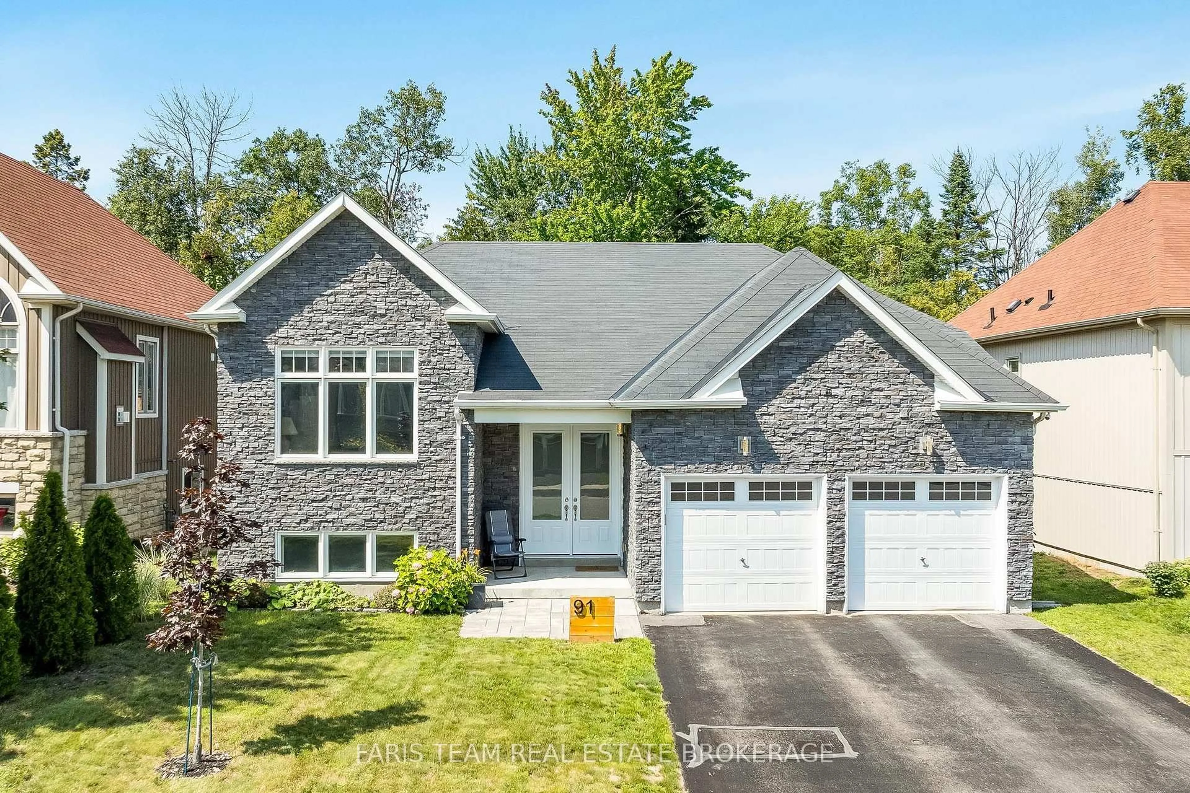 Home with brick exterior material, street for 91 Allegra Dr, Wasaga Beach Ontario L9Z 1P2