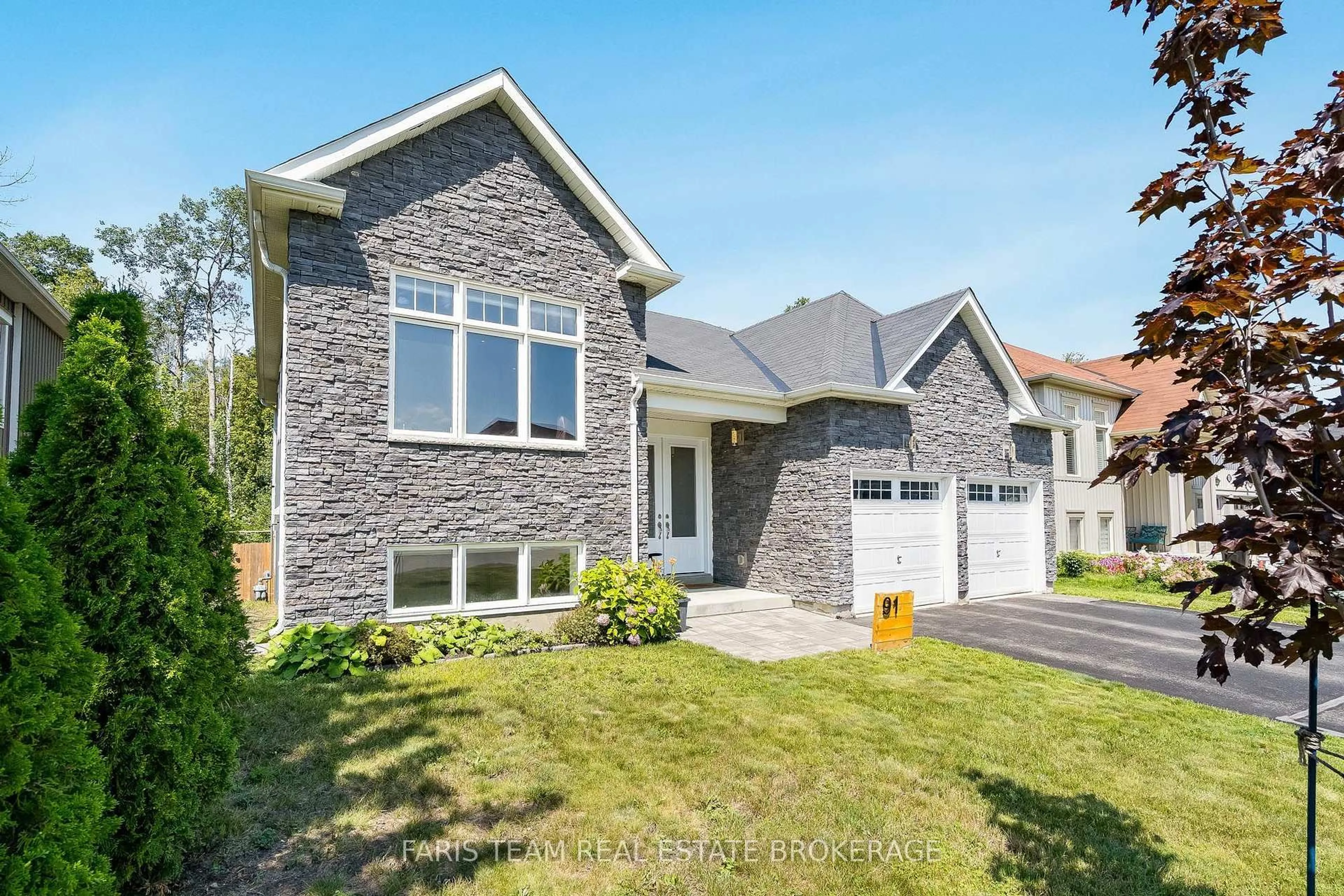 Home with brick exterior material, street for 91 Allegra Dr, Wasaga Beach Ontario L9Z 1P2