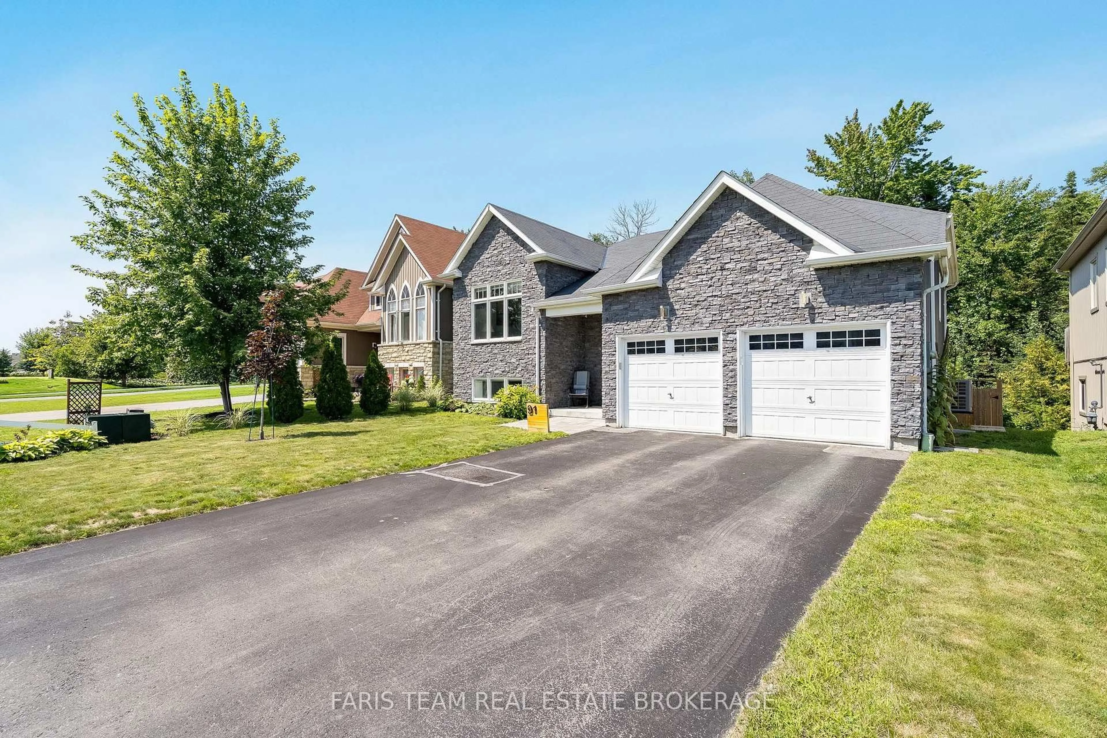 Home with brick exterior material, street for 91 Allegra Dr, Wasaga Beach Ontario L9Z 1P2