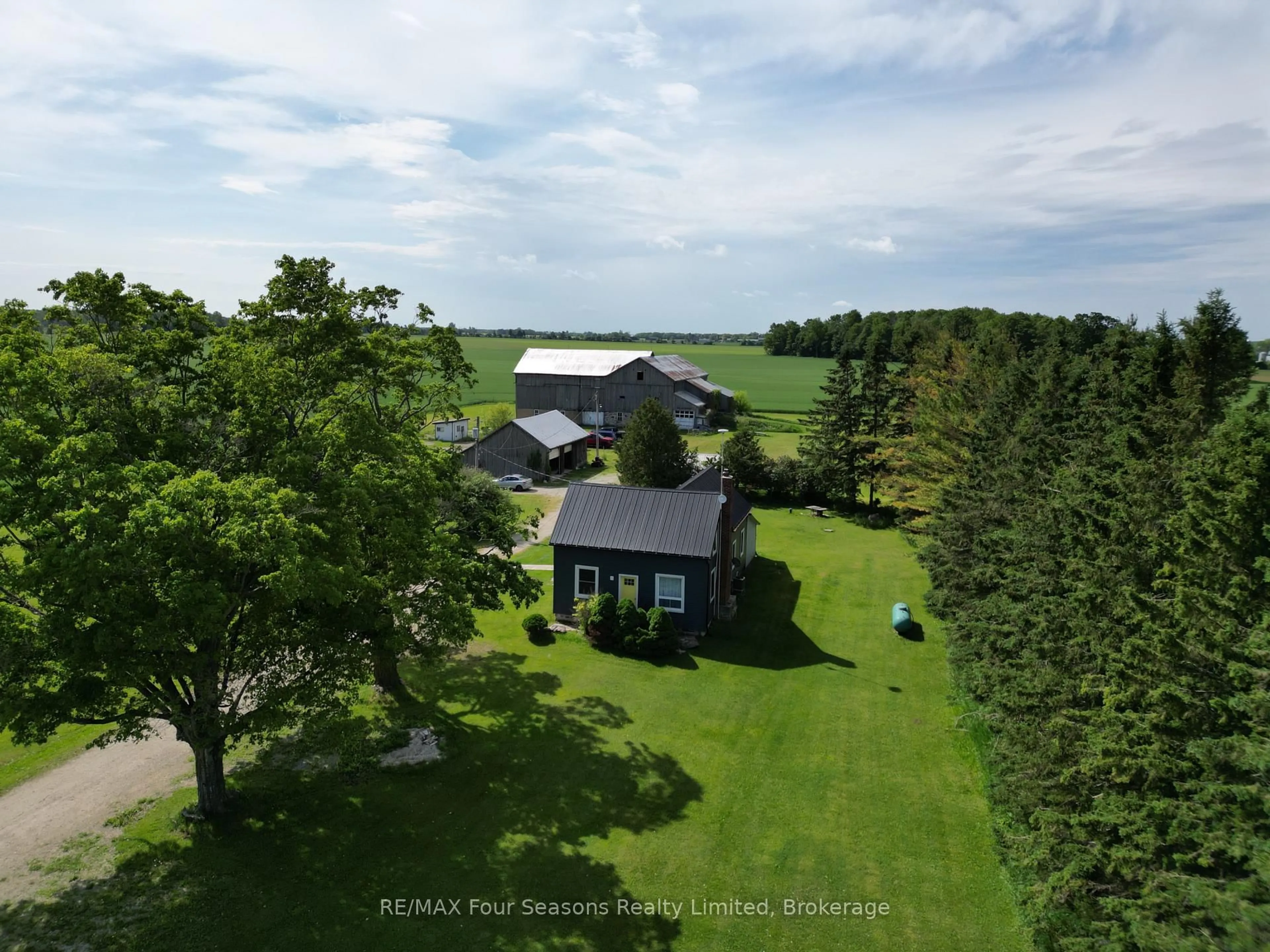 A pic from outside/outdoor area/front of a property/back of a property/a pic from drone, water/lake/river/ocean view for 5803 26 Highway, Clearview Ontario L0M 1S0