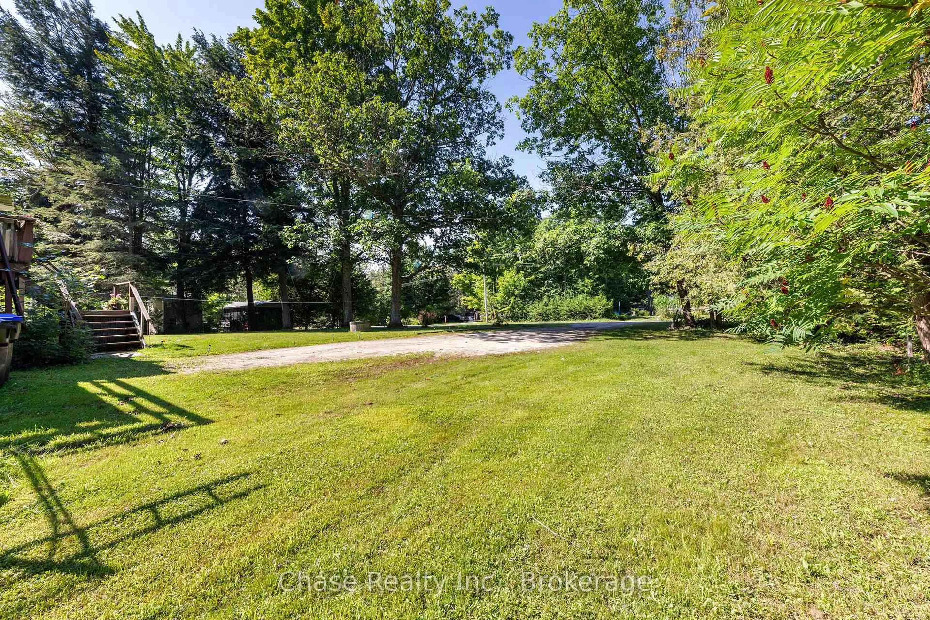 A pic from outside/outdoor area/front of a property/back of a property/a pic from drone, water/lake/river/ocean view for 655 Tiny Beaches Rd, Tiny Ontario L0L 2J0