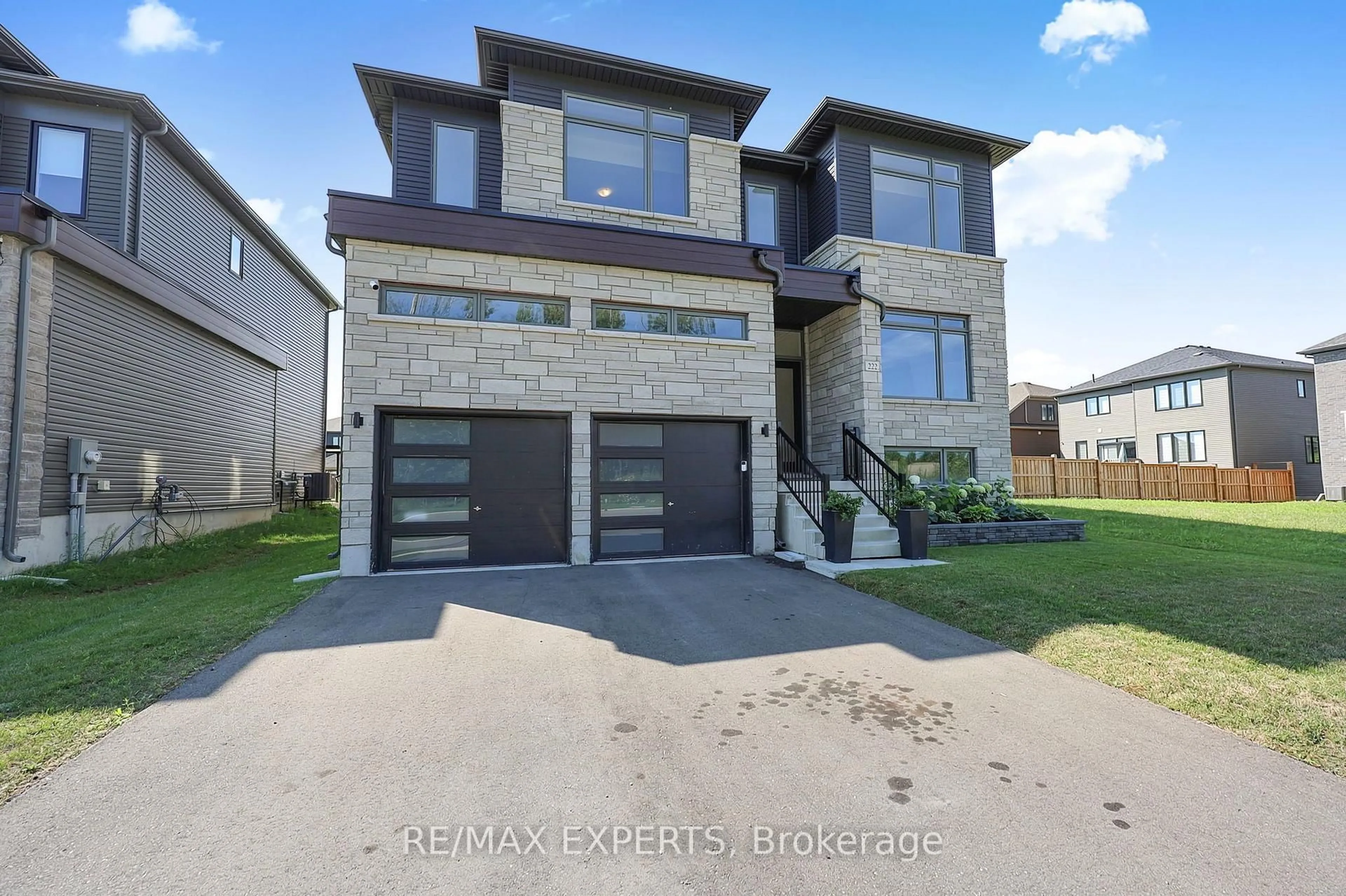 Home with brick exterior material, street for 222 Mapleside Dr, Wasaga Beach Ontario L9Z 0L4