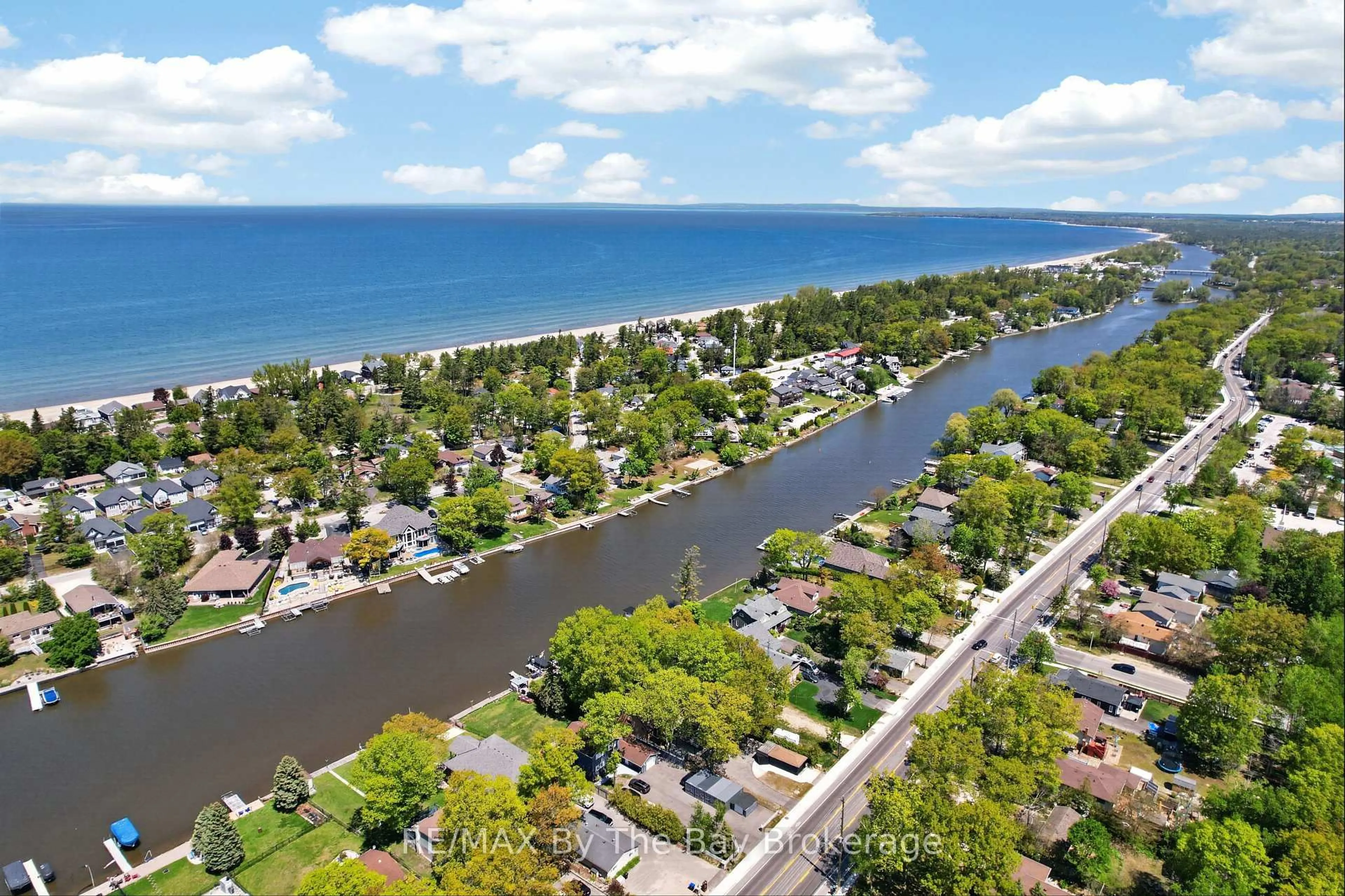 A pic from outside/outdoor area/front of a property/back of a property/a pic from drone, water/lake/river/ocean view for 1416 River Rd, Wasaga Beach Ontario L9Z 2W5