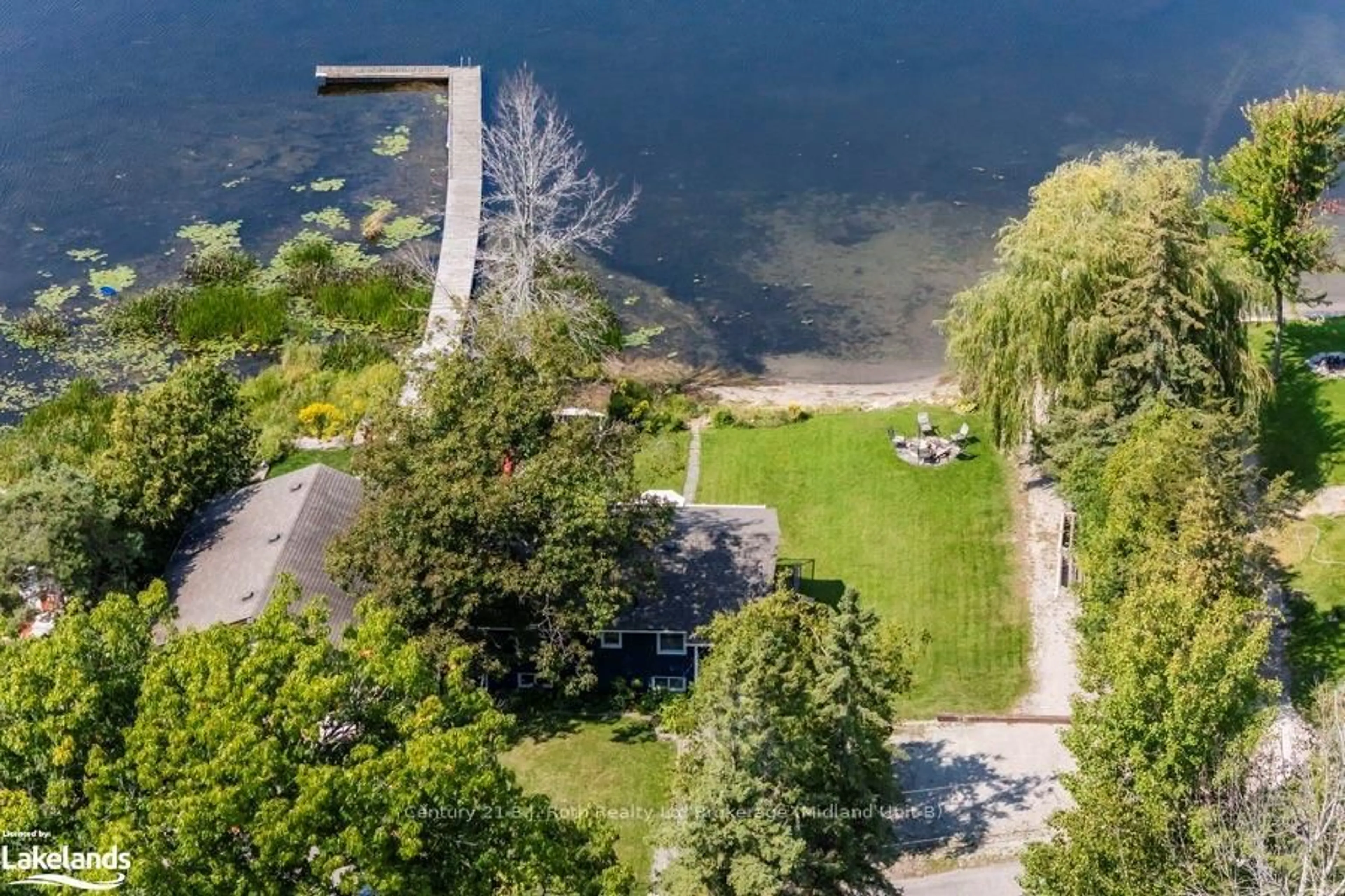 A pic from outside/outdoor area/front of a property/back of a property/a pic from drone, water/lake/river/ocean view for 142 - 140 MITCHELLS BEACH Rd, Tay Ontario L0K 2A0
