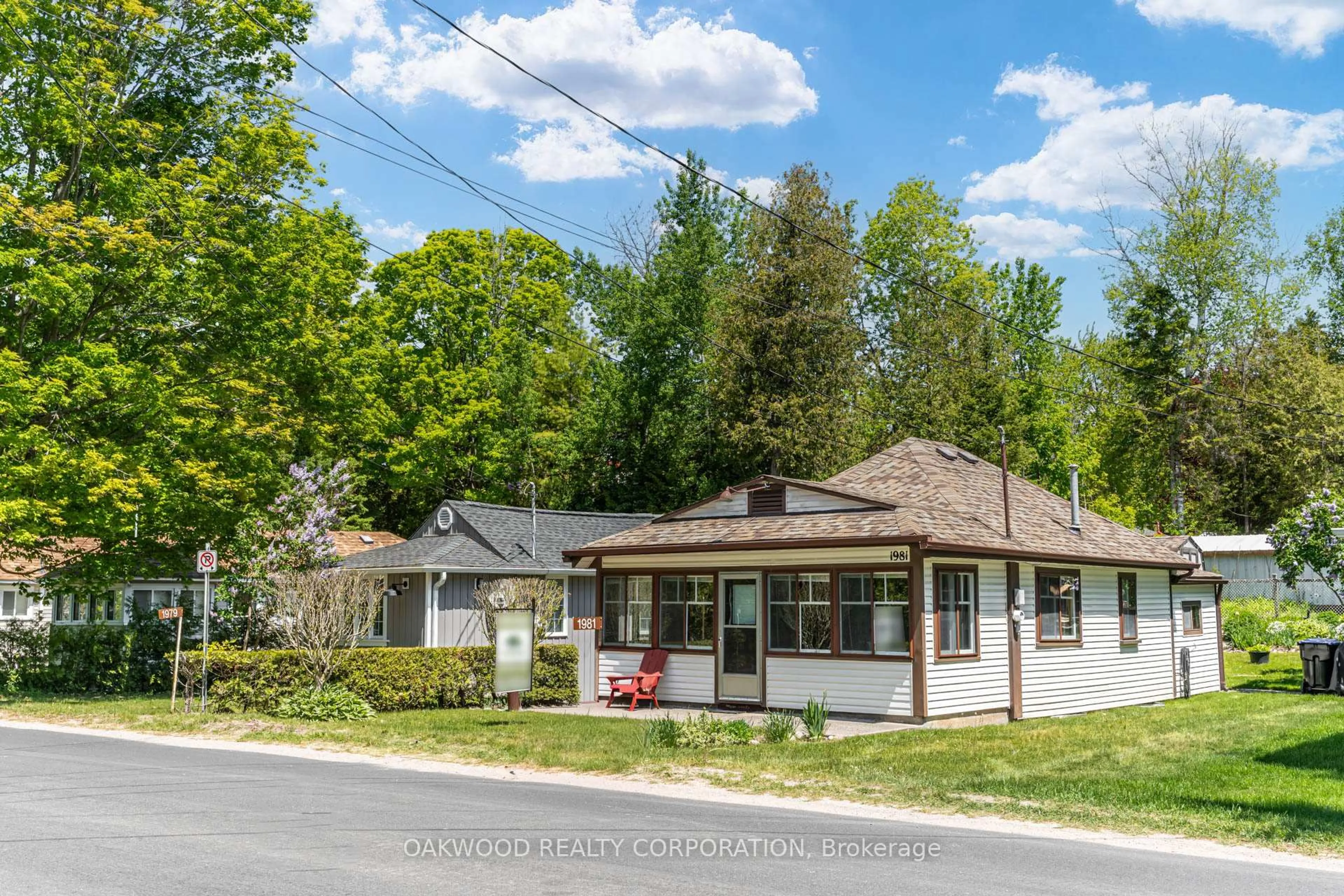 A pic from outside/outdoor area/front of a property/back of a property/a pic from drone, street for 1981 Tiny Beaches Rd, Tiny Ontario L9M 1R3