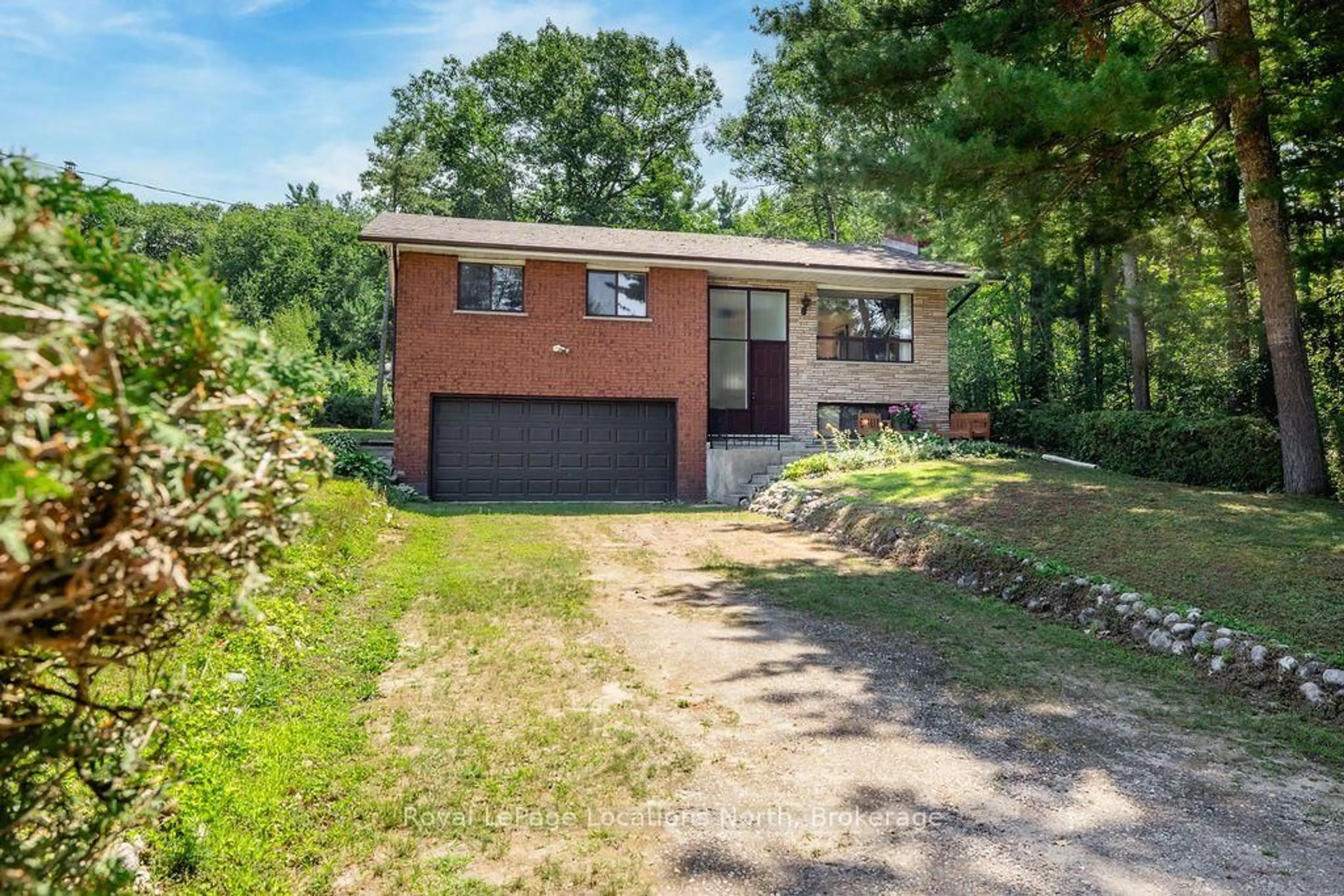 Home with brick exterior material, street for 1928 Champlain Rd, Tiny Ontario L9M 0B6
