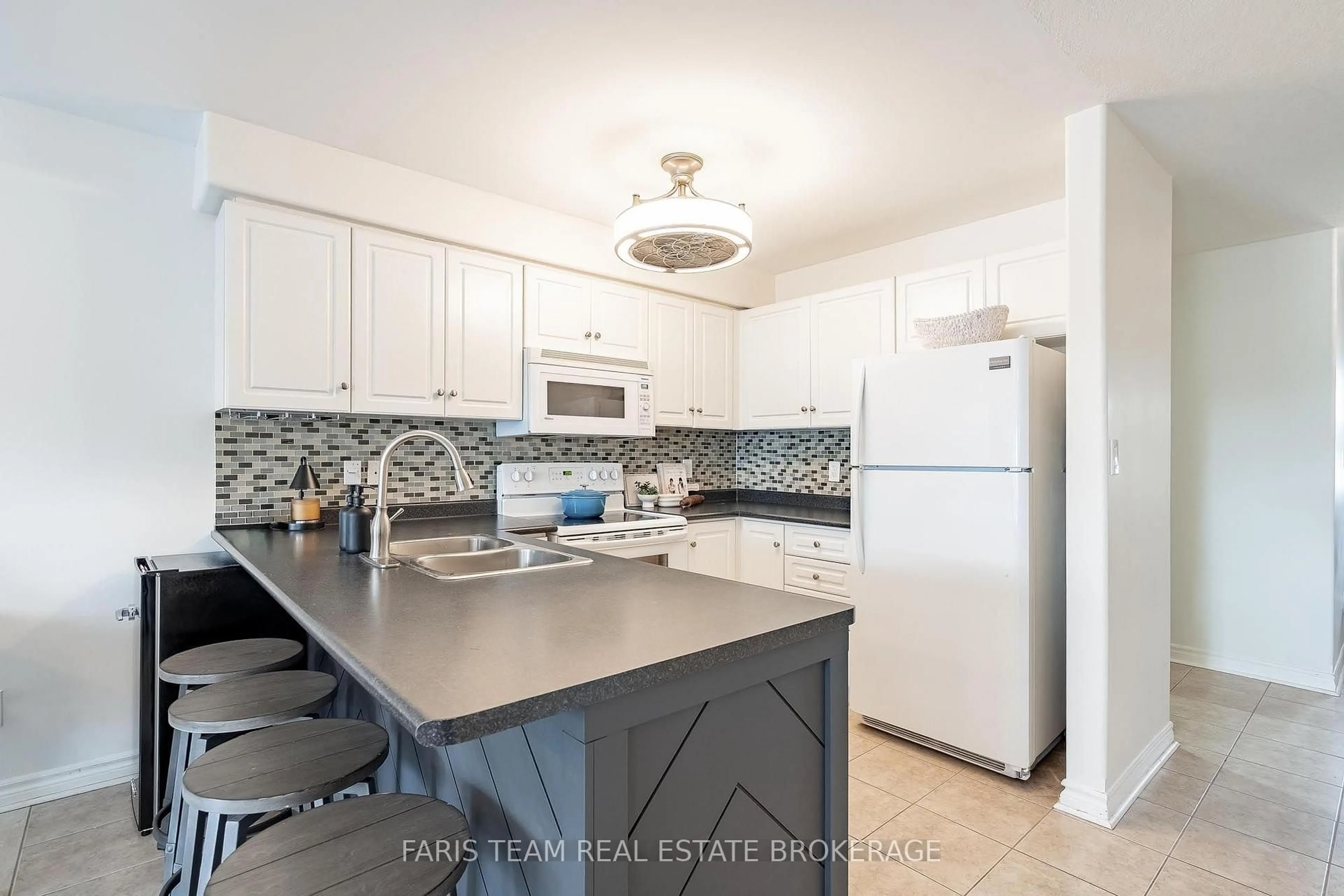 Standard kitchen, ceramic/tile floor for 79 Sanford St, Barrie Ontario L4N 3C6