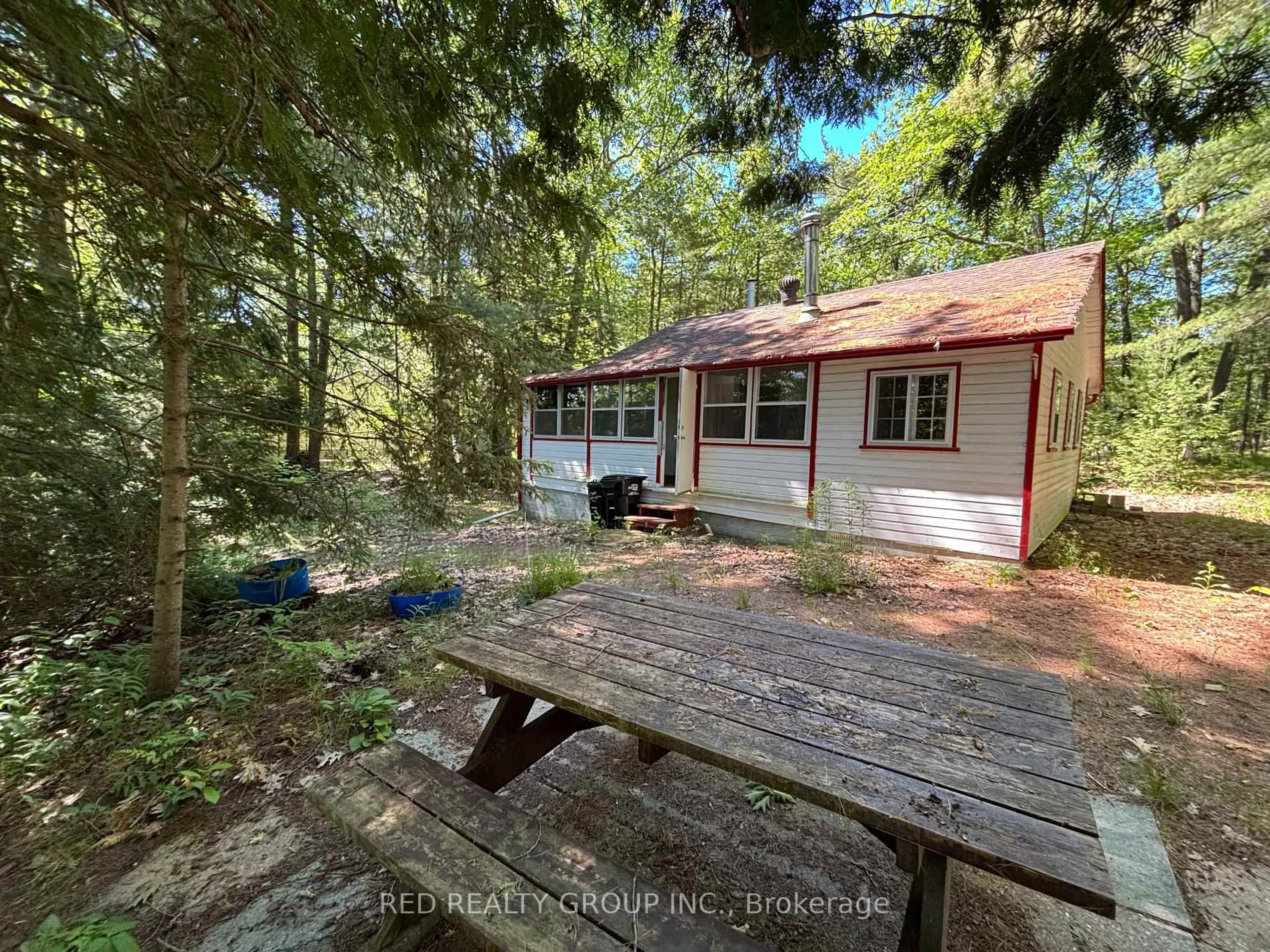 A pic from outside/outdoor area/front of a property/back of a property/a pic from drone, forest/trees view for 195 Sunnidale Rd, Wasaga Beach Ontario L9Z 2T3