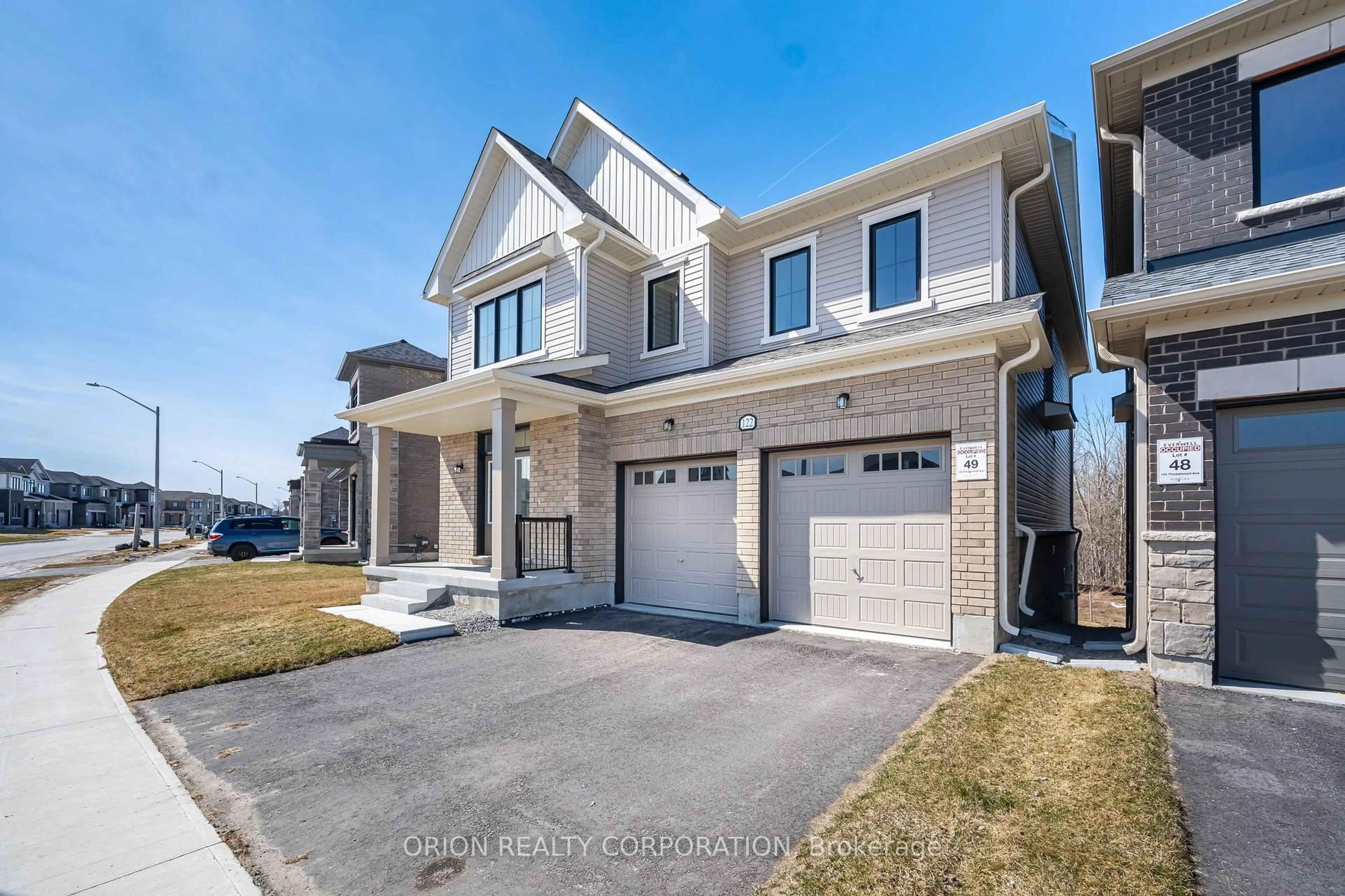 Home with brick exterior material, street for 122 Thicketwood Ave, Barrie Ontario L9J 0W8