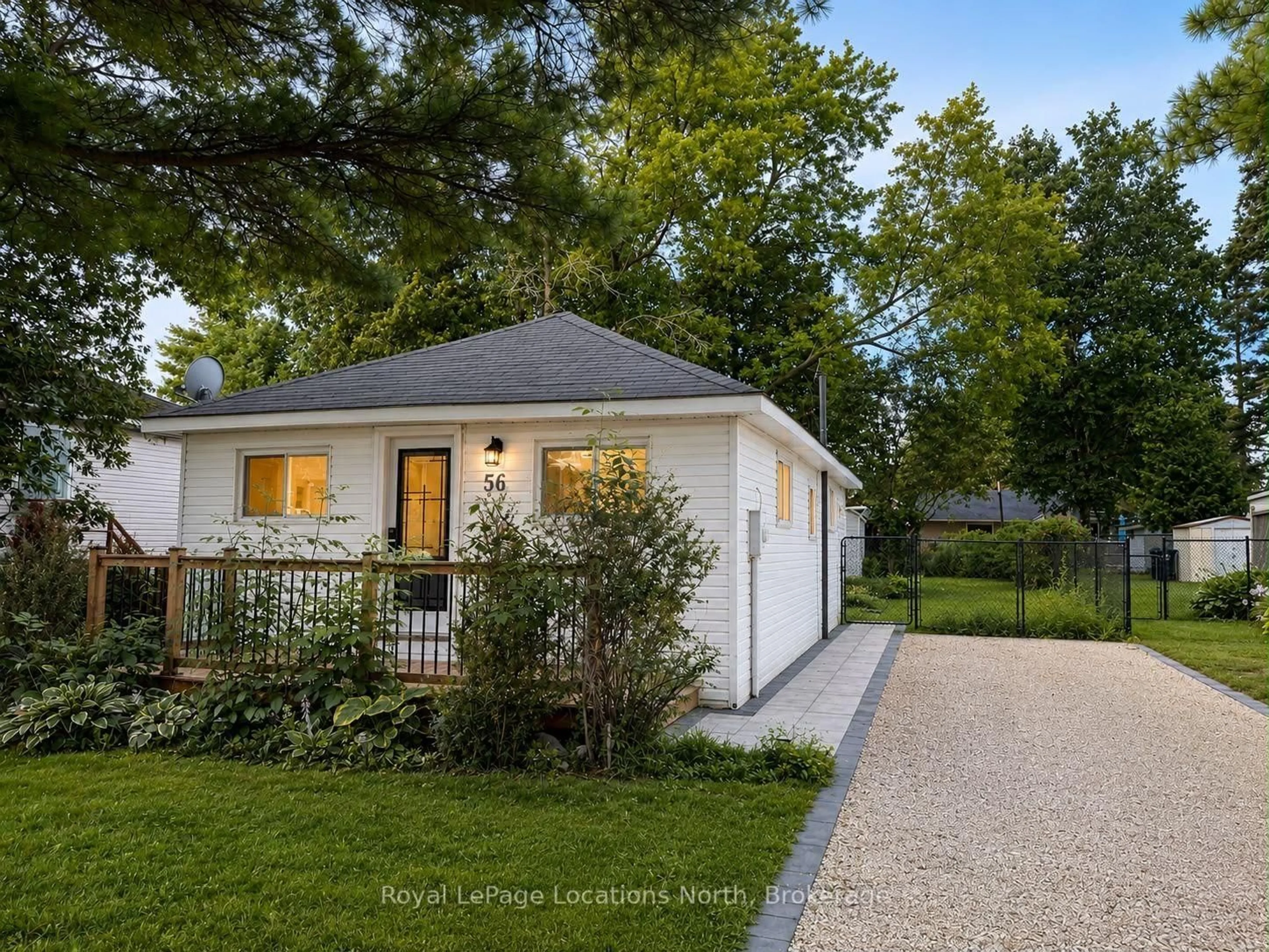 Home with vinyl exterior material, street for 56 68th St, Wasaga Beach Ontario L9Z 1T8