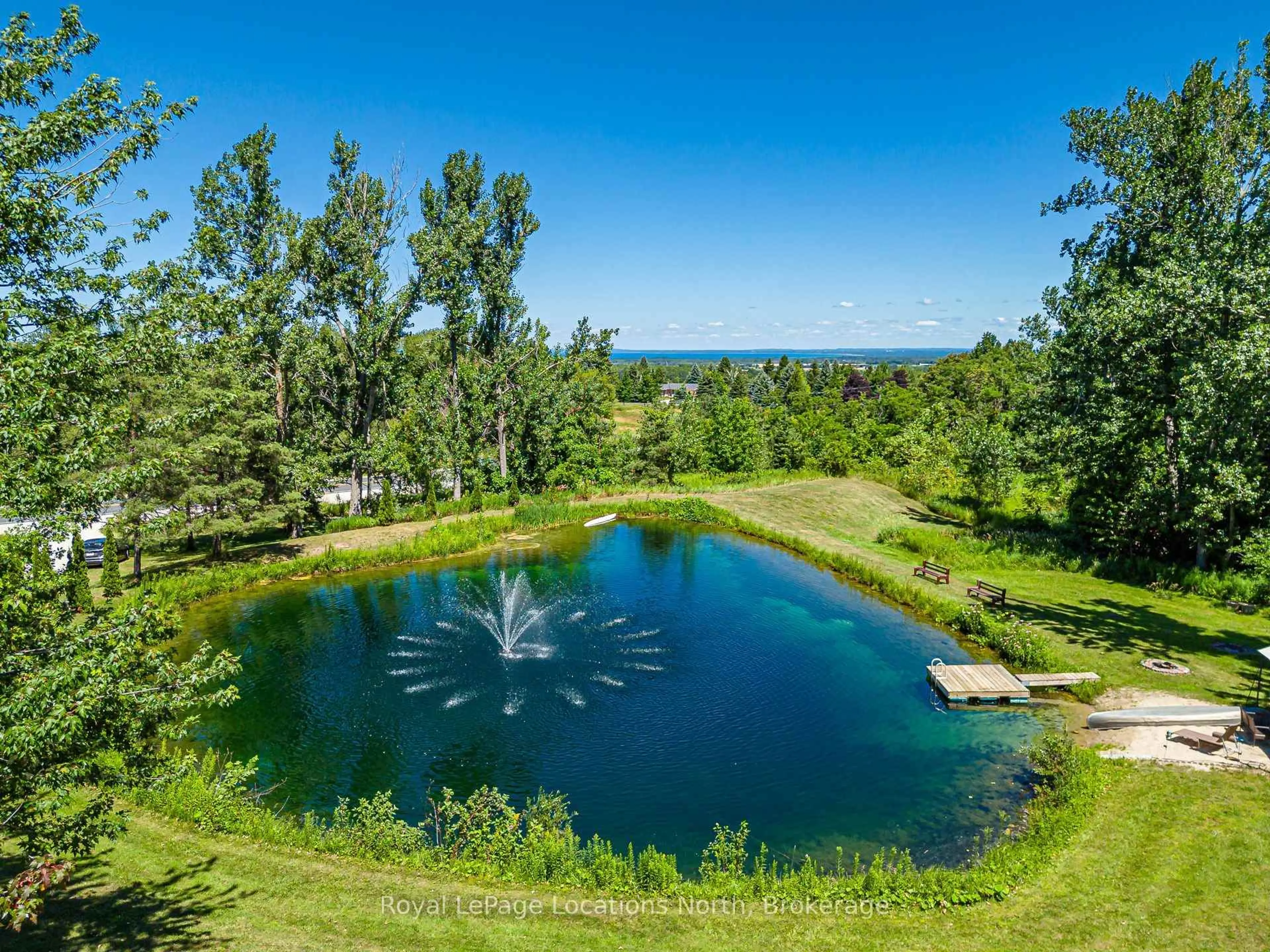 A pic from outside/outdoor area/front of a property/back of a property/a pic from drone, water/lake/river/ocean view for 8941 County 91 Rd, Clearview Ontario L0M 1H0