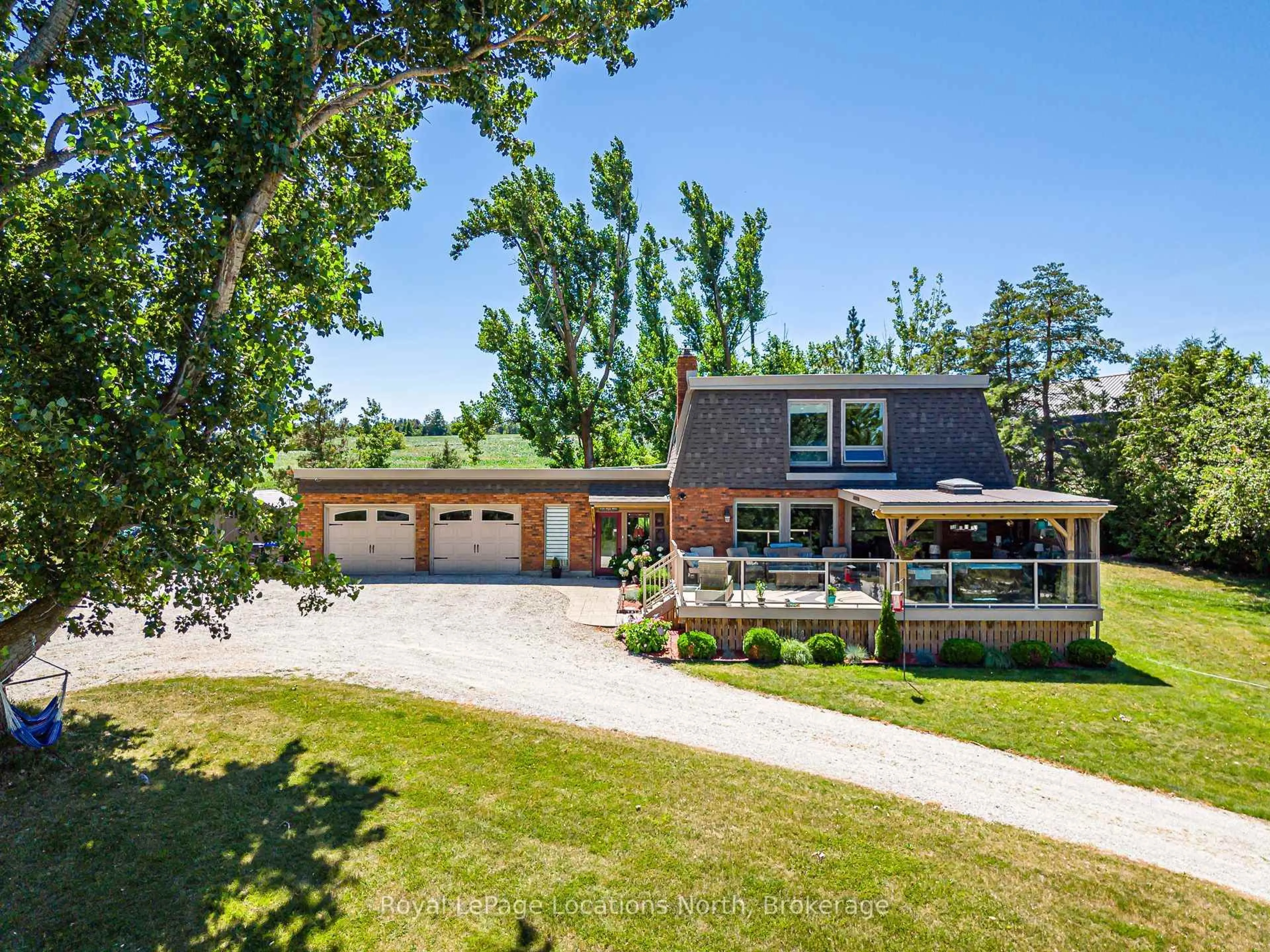 A pic from outside/outdoor area/front of a property/back of a property/a pic from drone, unknown for 8941 County 91 Rd, Clearview Ontario L0M 1H0