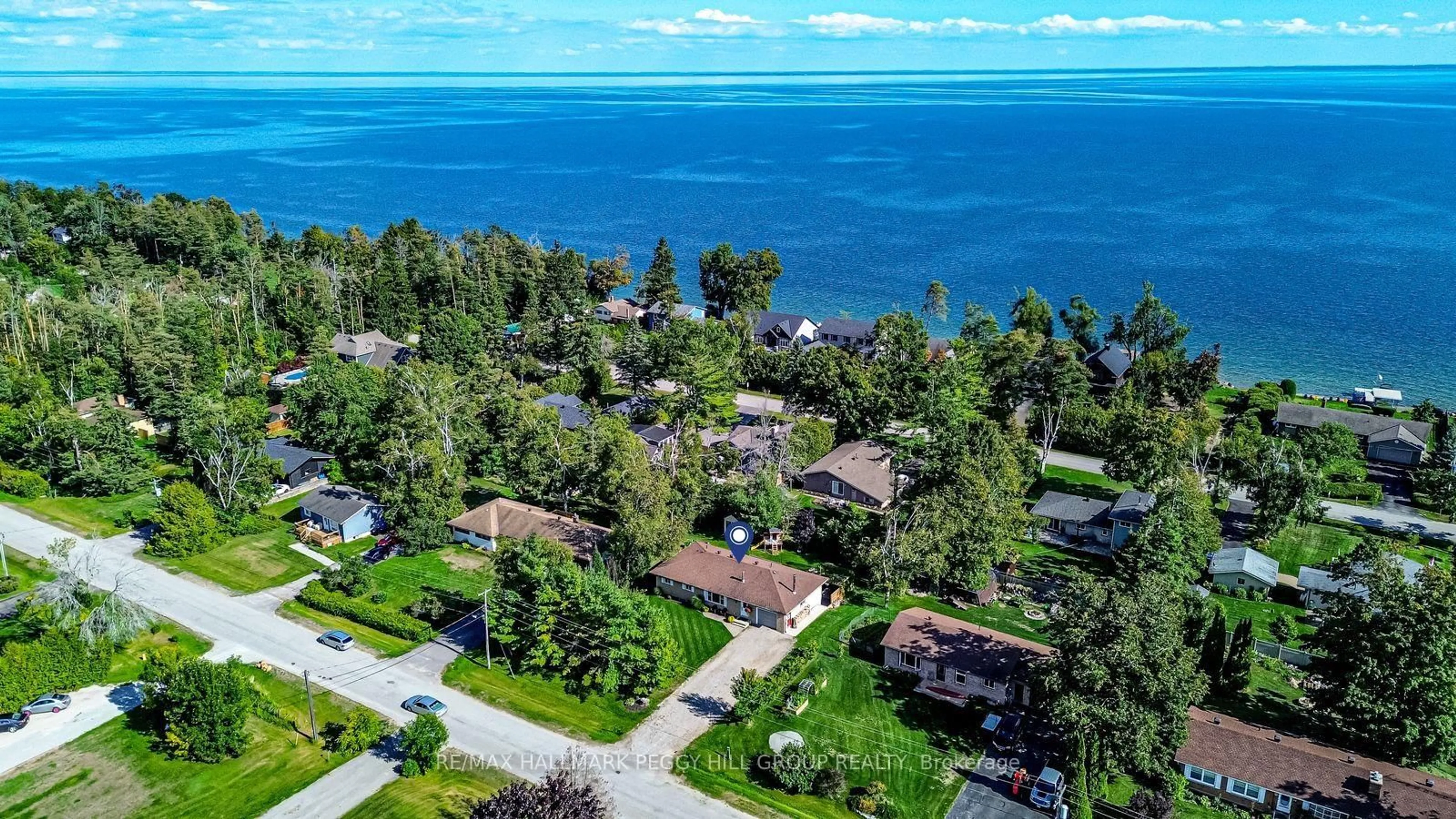A pic from outside/outdoor area/front of a property/back of a property/a pic from drone, water/lake/river/ocean view for 55 Shelswell Blvd, Oro-Medonte Ontario L0L 2E0