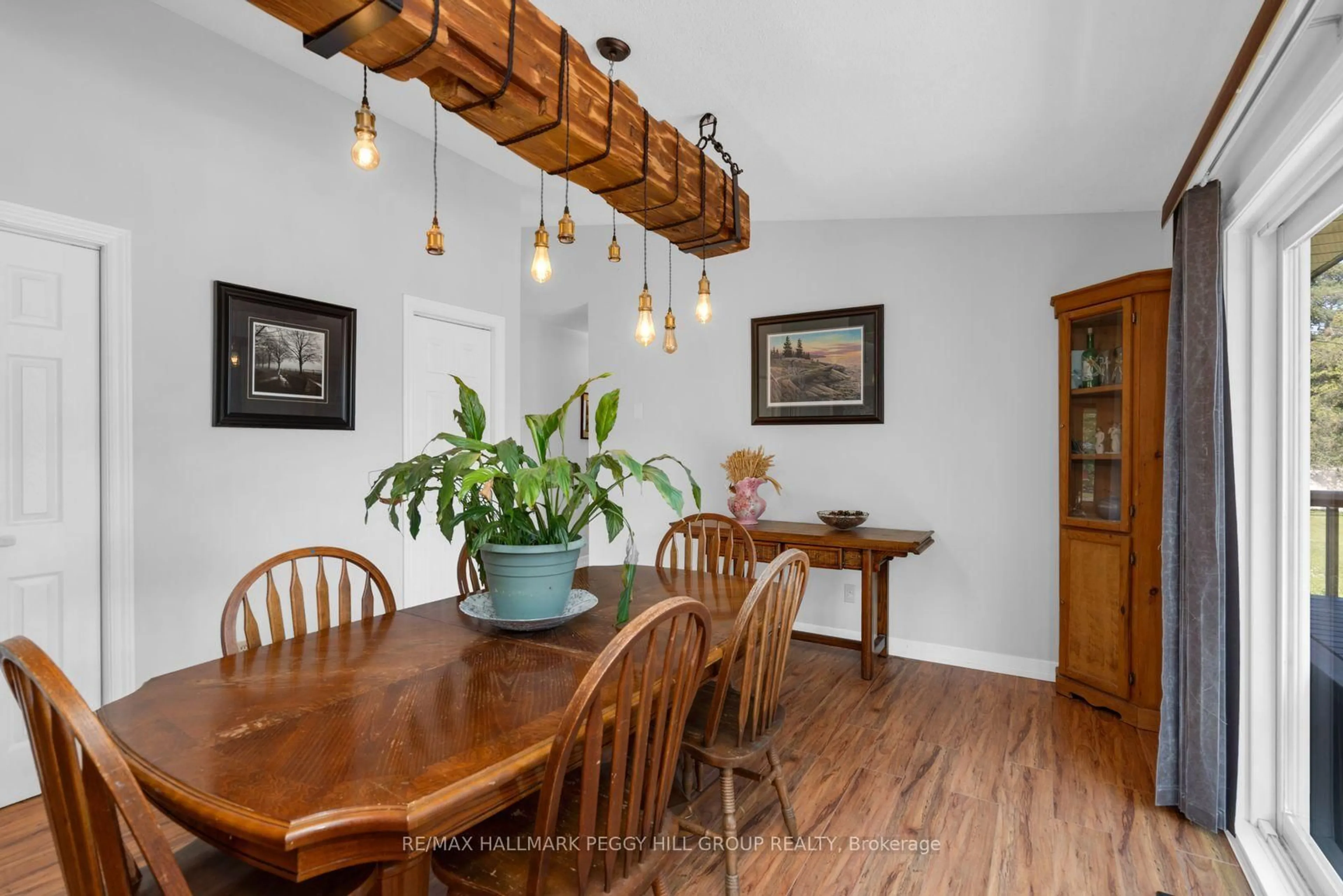 Dining room, wood/laminate floor for 55 Shelswell Blvd, Oro-Medonte Ontario L0L 2E0