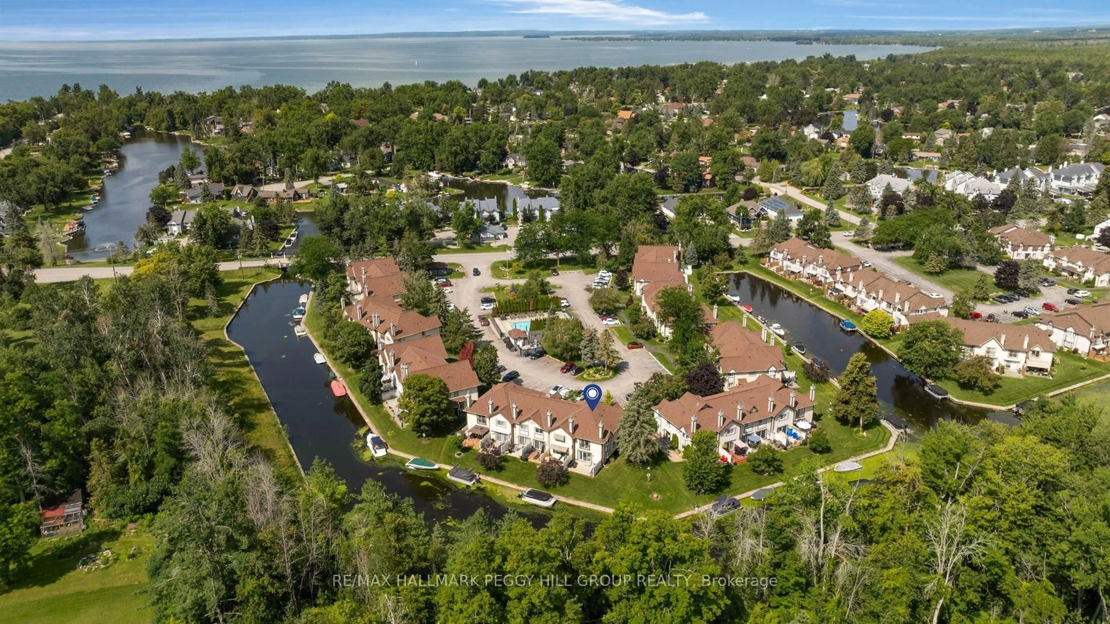A pic from outside/outdoor area/front of a property/back of a property/a pic from drone, water/lake/river/ocean view for 11 Laguna Pkwy #28, Ramara Ontario L0K 1B0