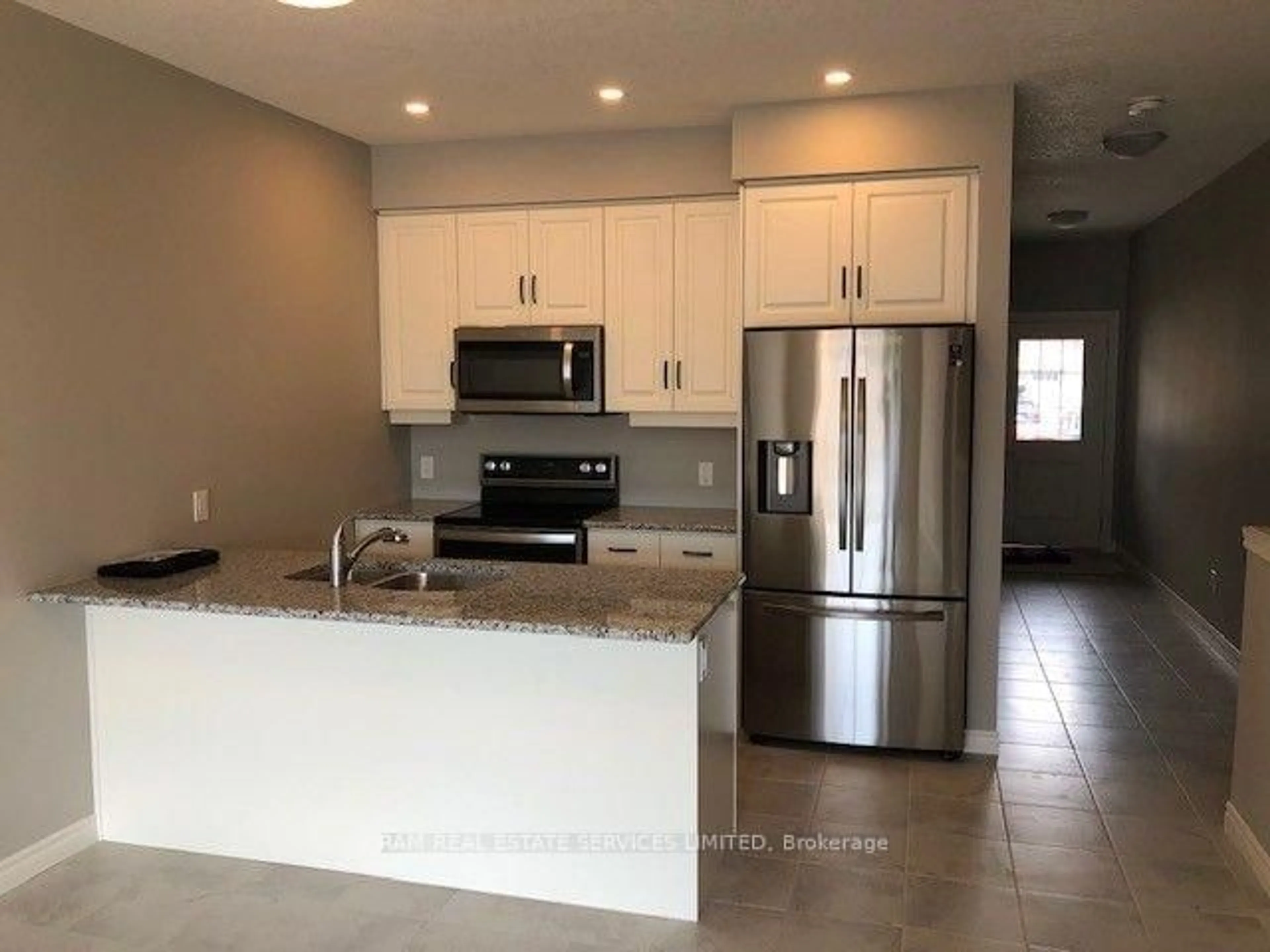 Open concept kitchen, ceramic/tile floor for 981 wright Dr, Midland Ontario L4R 0E4