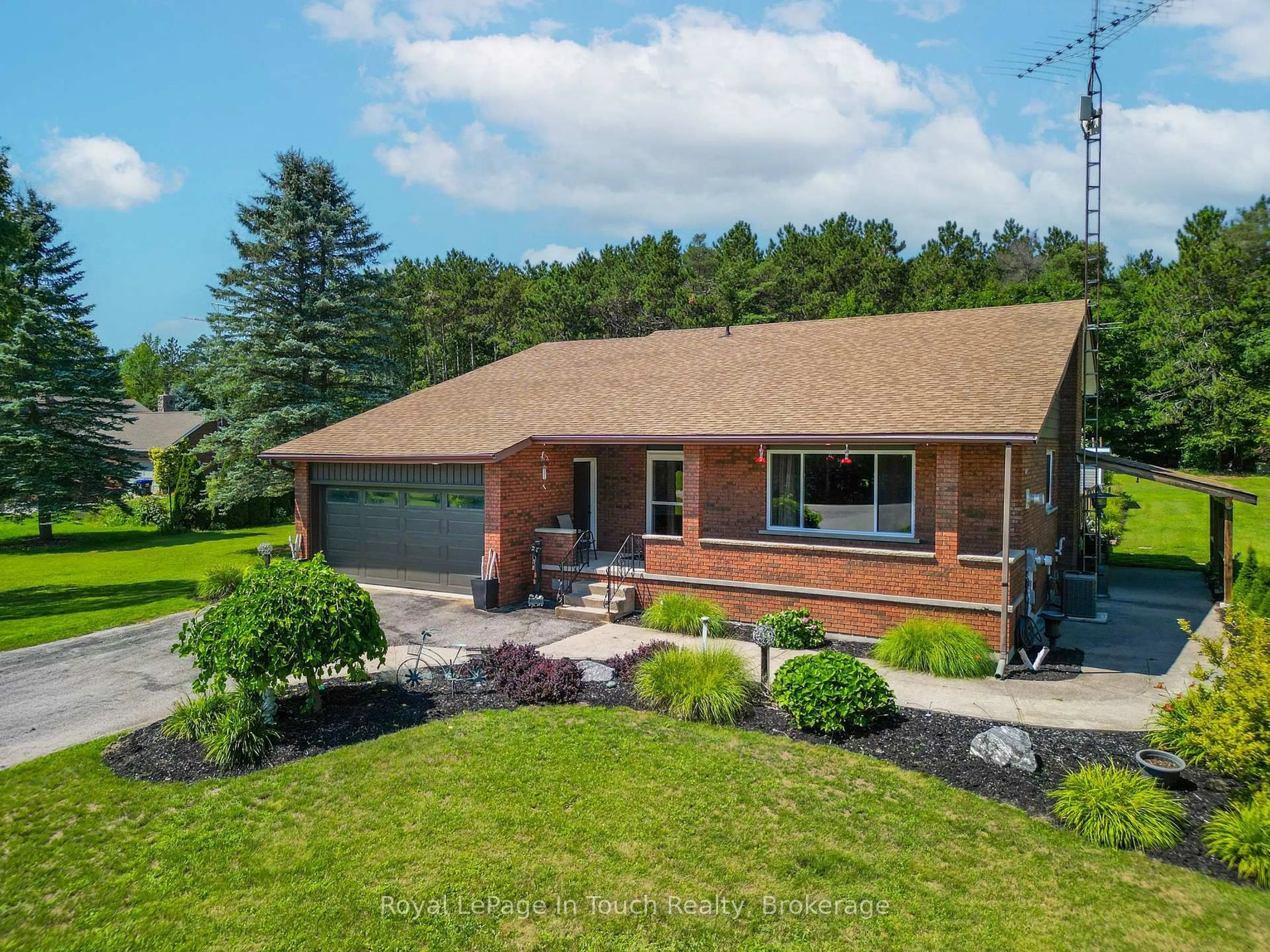 A pic from outside/outdoor area/front of a property/back of a property/a pic from drone, street for 80 12 Concession, Tiny Ontario L0L 2J0