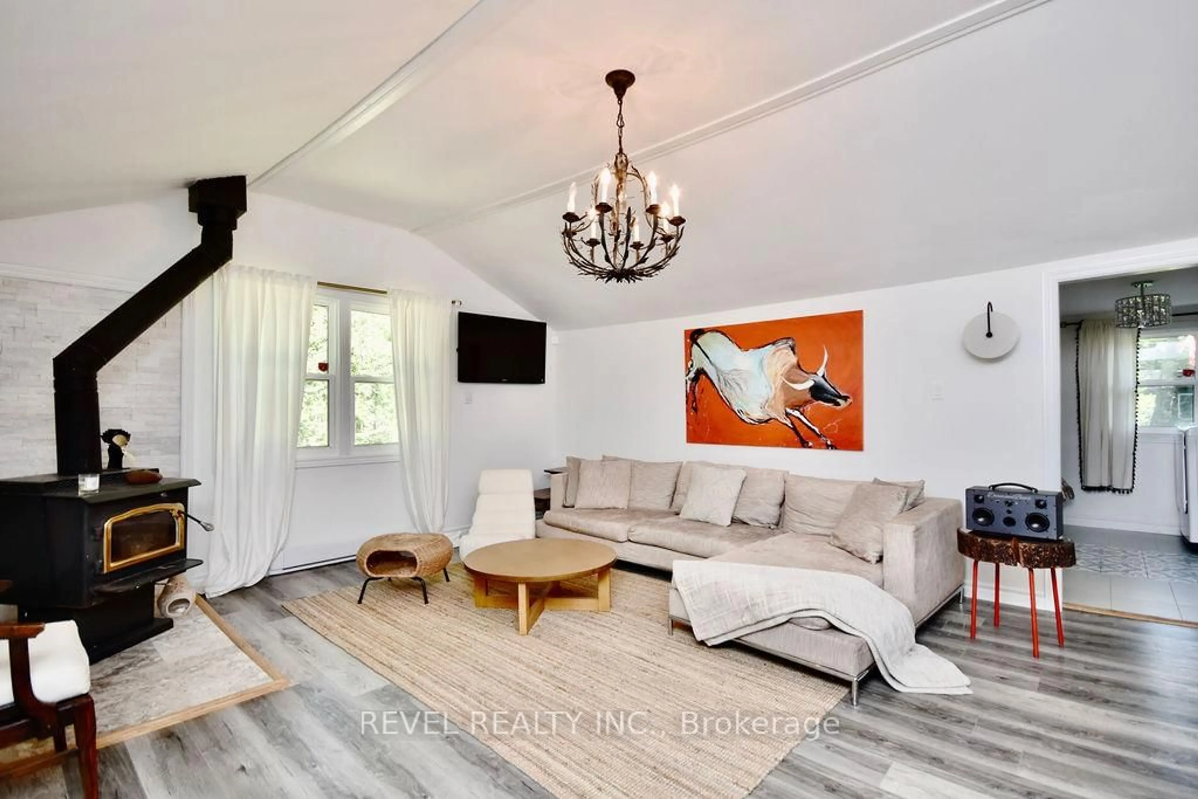 Living room with furniture, wood/laminate floor for 39 Domar Rd, Tiny Ontario L0L 2J0