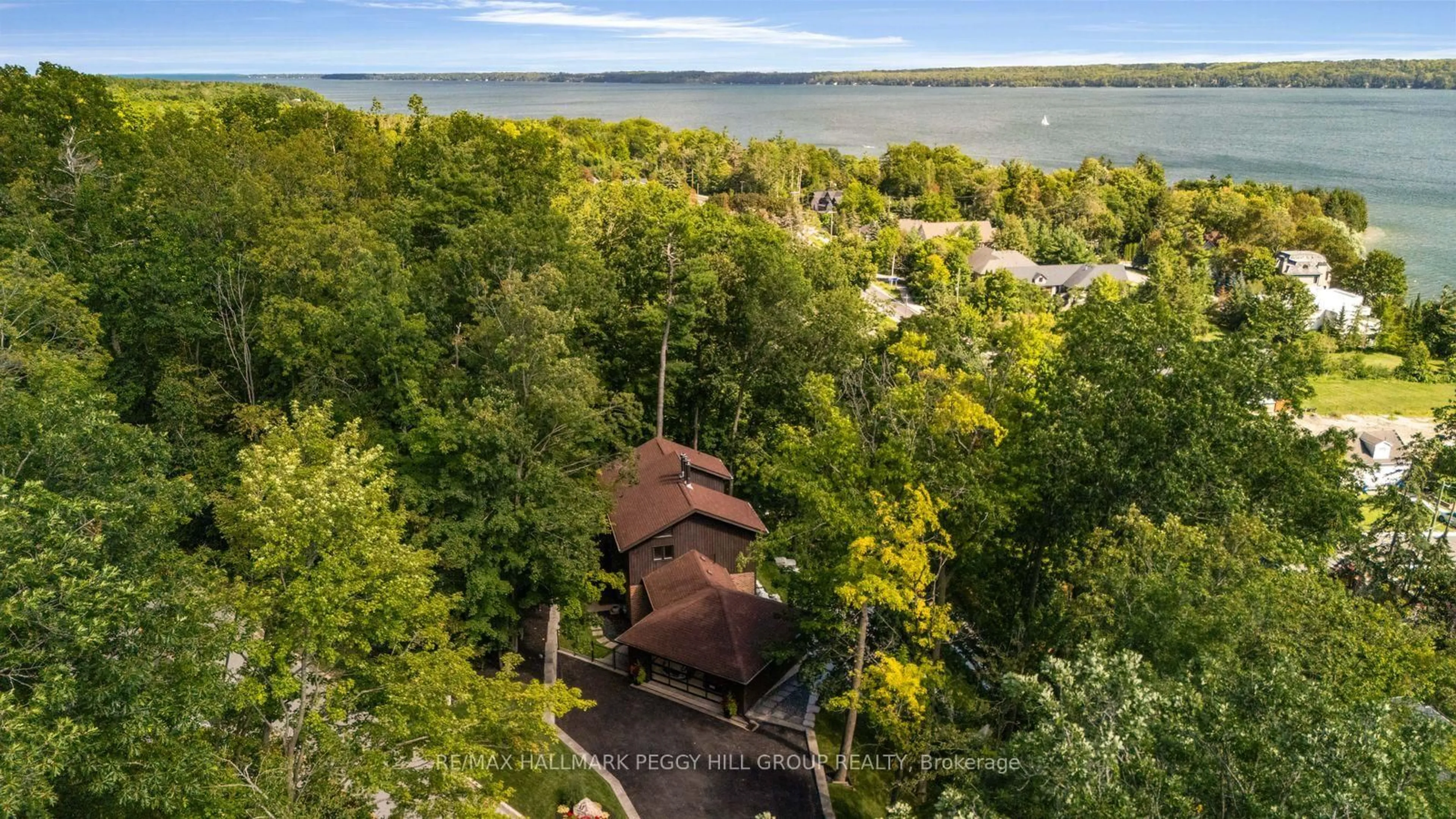 A pic from outside/outdoor area/front of a property/back of a property/a pic from drone, water/lake/river/ocean view for 11 Crestwood Dr, Barrie Ontario L4M 7C8