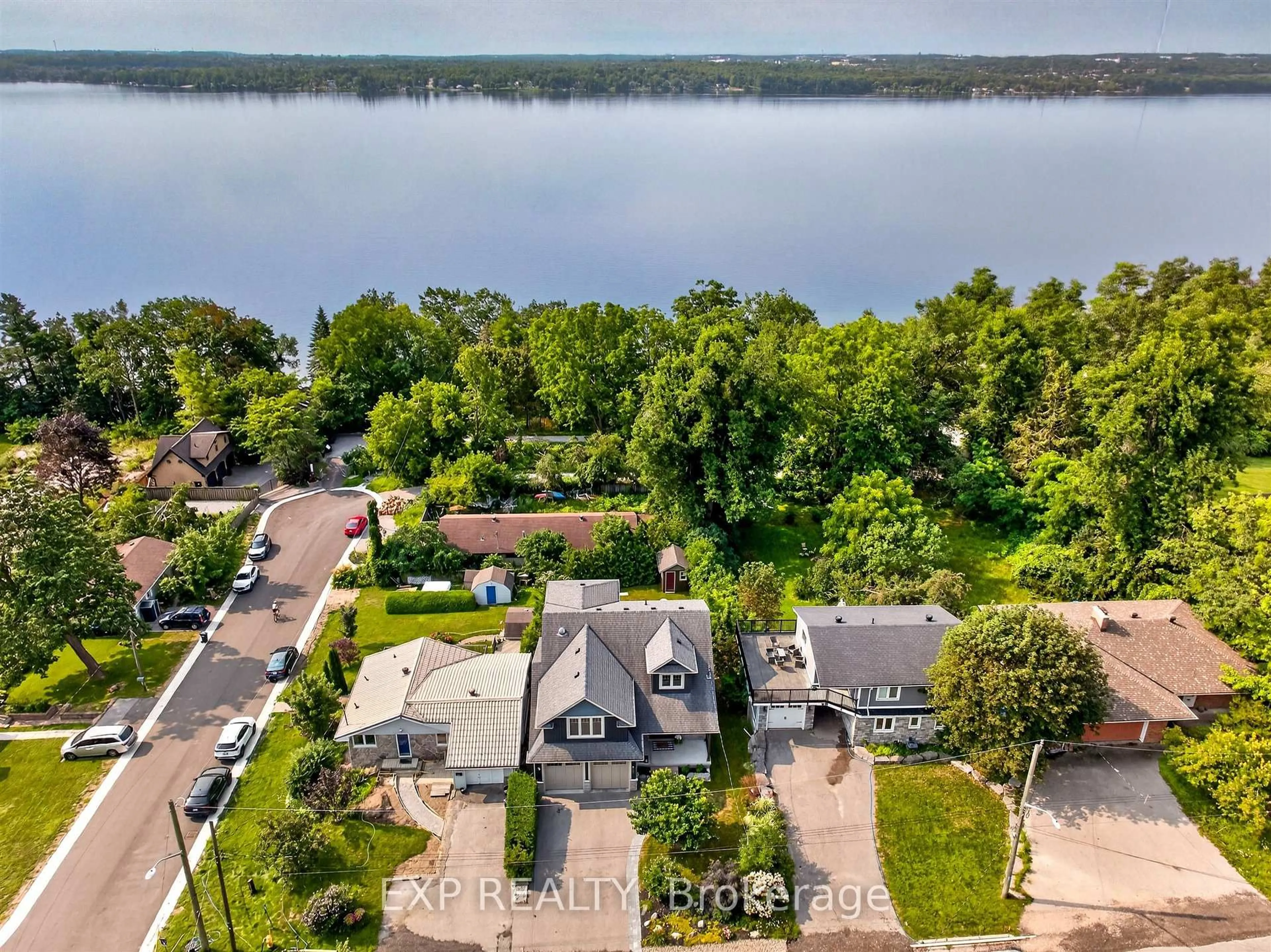 A pic from outside/outdoor area/front of a property/back of a property/a pic from drone, water/lake/river/ocean view for 187 Shanty Bay Rd, Barrie Ontario L4M 1E1