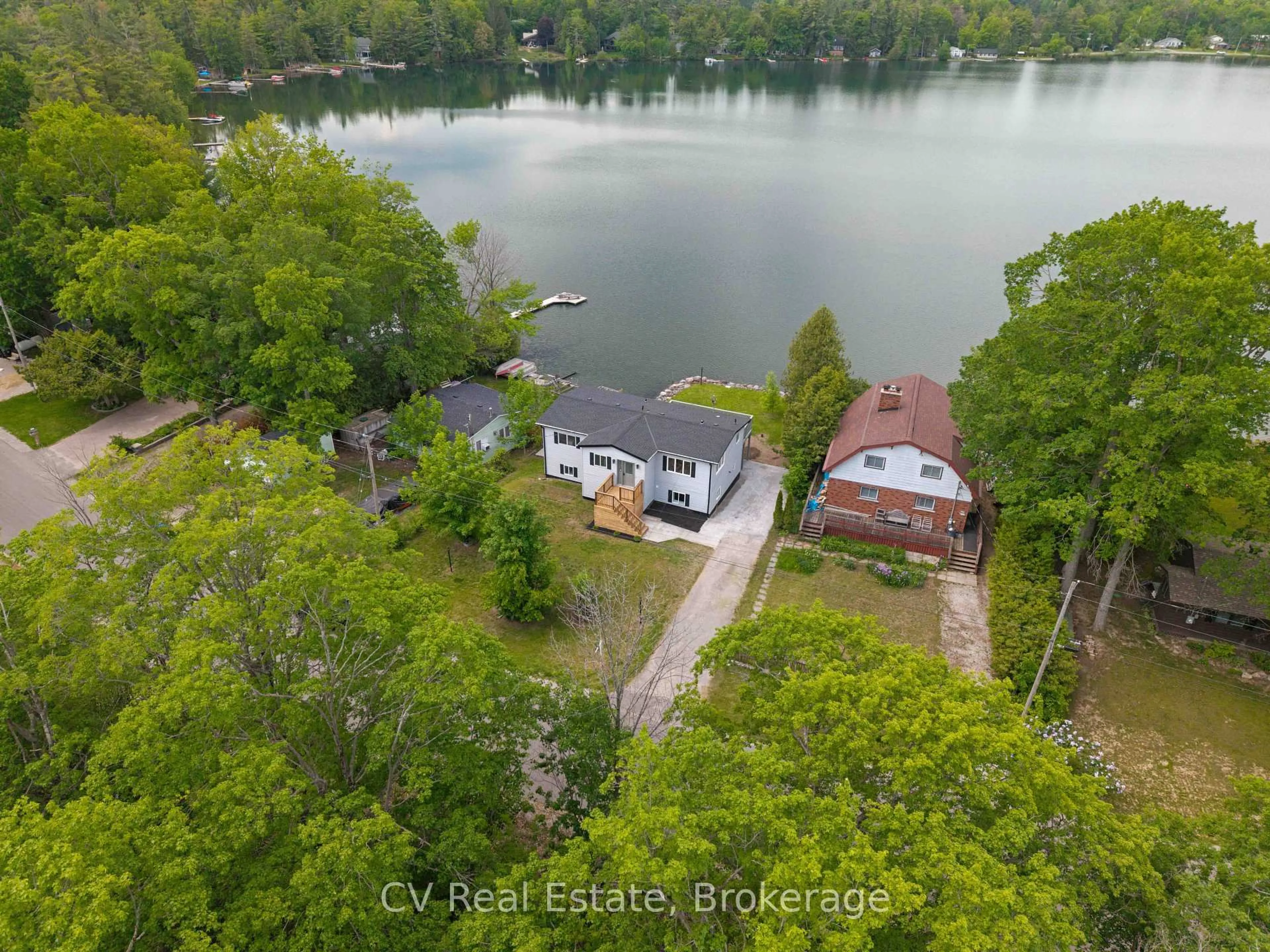 A pic from outside/outdoor area/front of a property/back of a property/a pic from drone, water/lake/river/ocean view for 3338 Cox Dr, Severn Ontario L0K 2B0