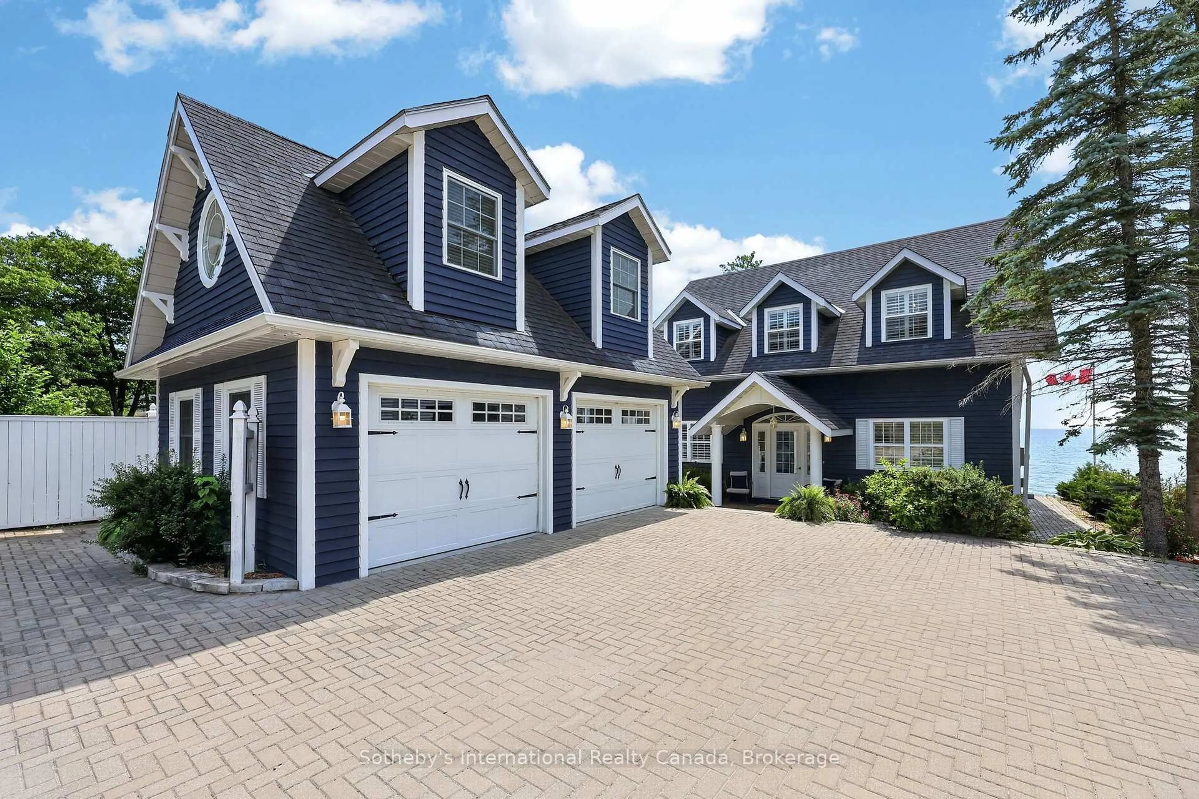 Home with vinyl exterior material, street for 10 Lundy Lane, Tiny Ontario L0L 2J0