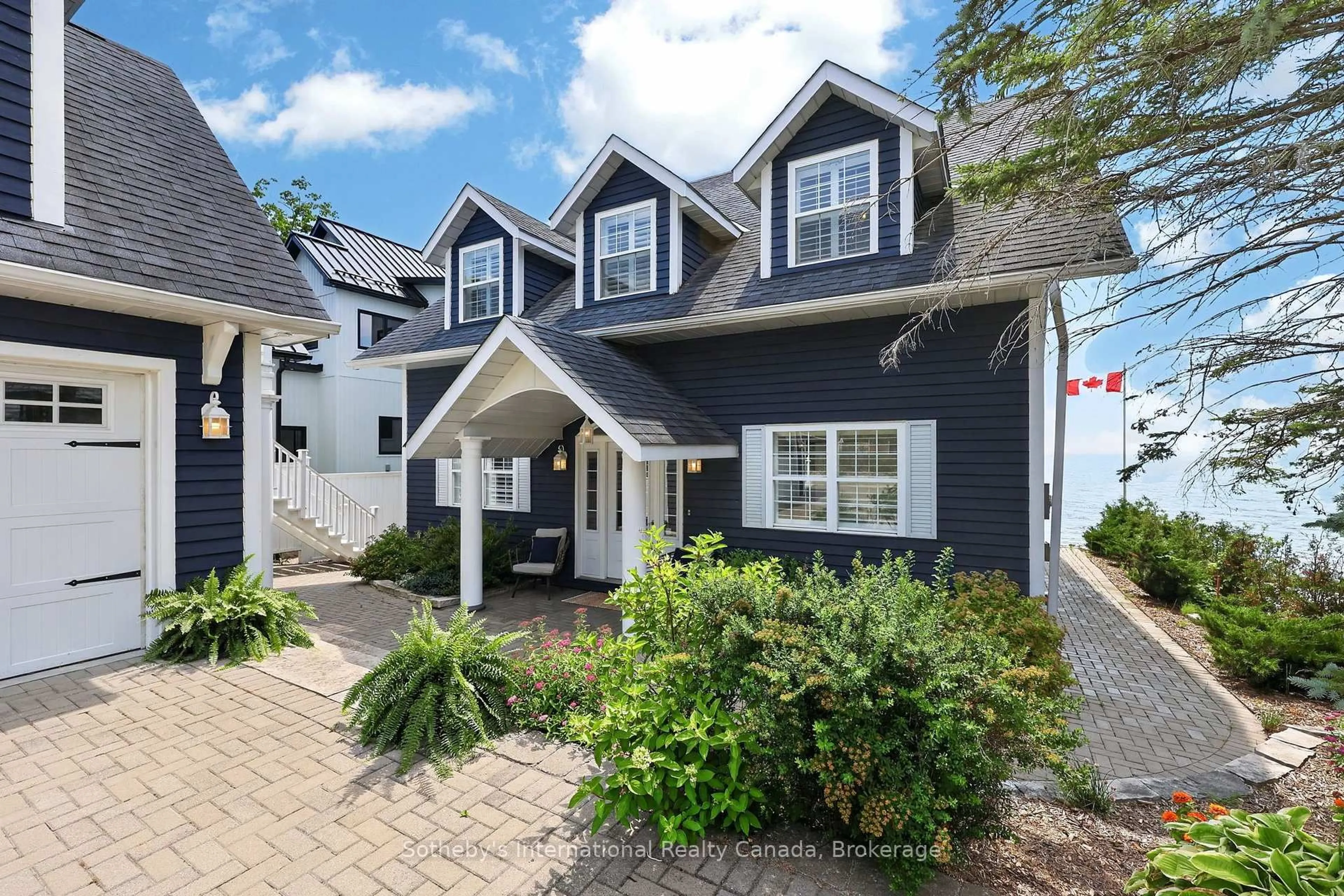 Home with vinyl exterior material, street for 10 Lundy Lane, Tiny Ontario L0L 2J0