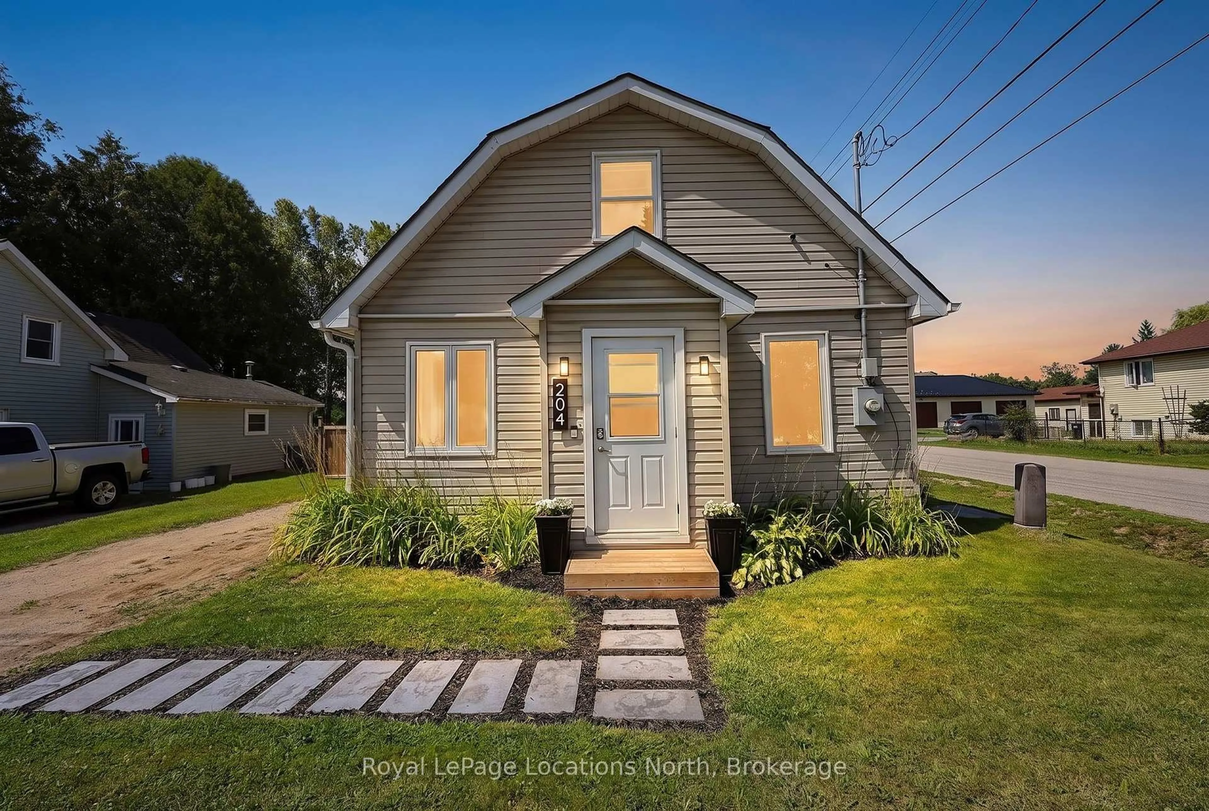 Home with vinyl exterior material, street for 204 Sutherland St, Clearview Ontario L0M 1S0