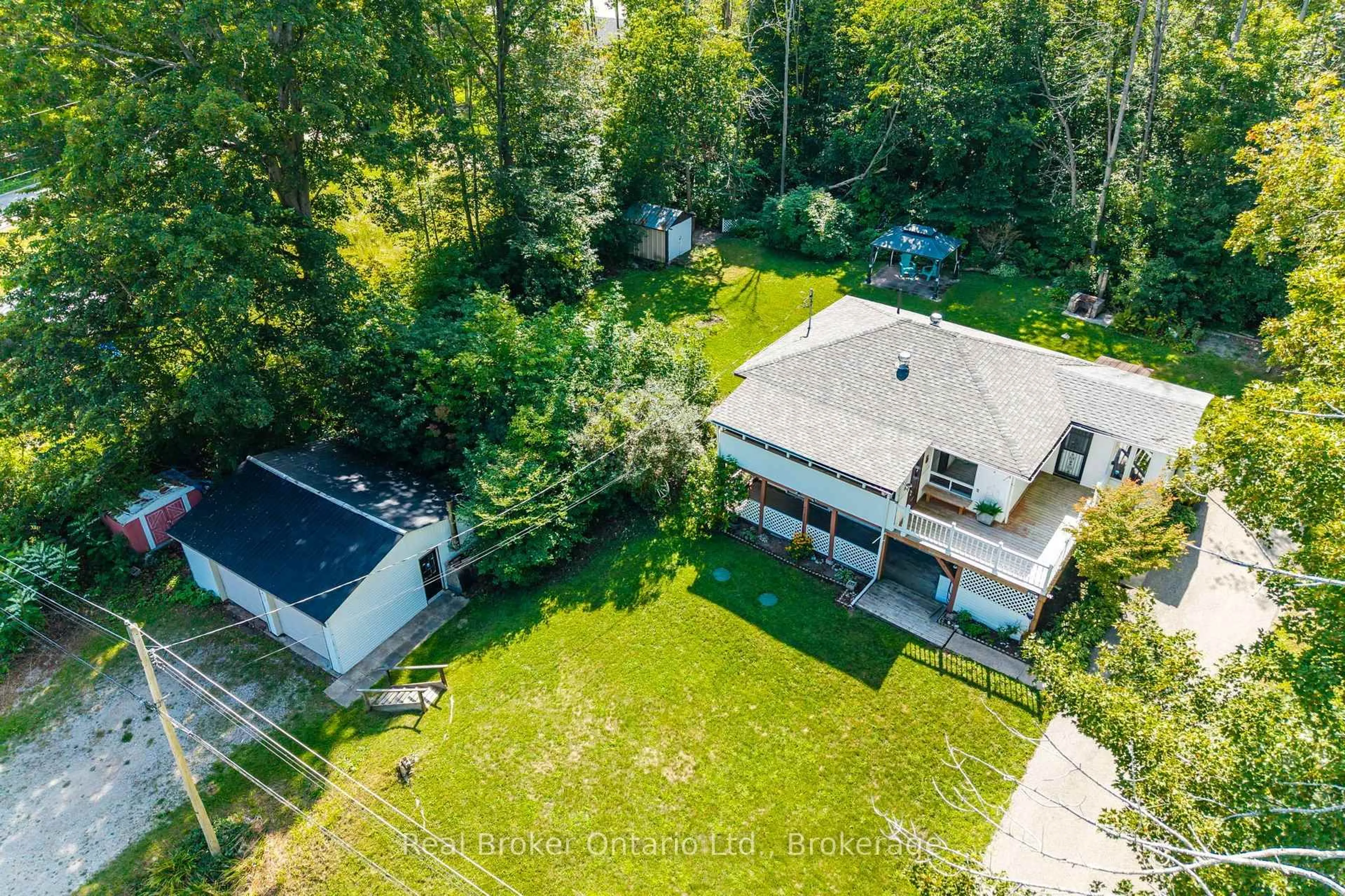 A pic from outside/outdoor area/front of a property/back of a property/a pic from drone, forest/trees view for 426 David Ave, Tay Ontario L0K 1R0