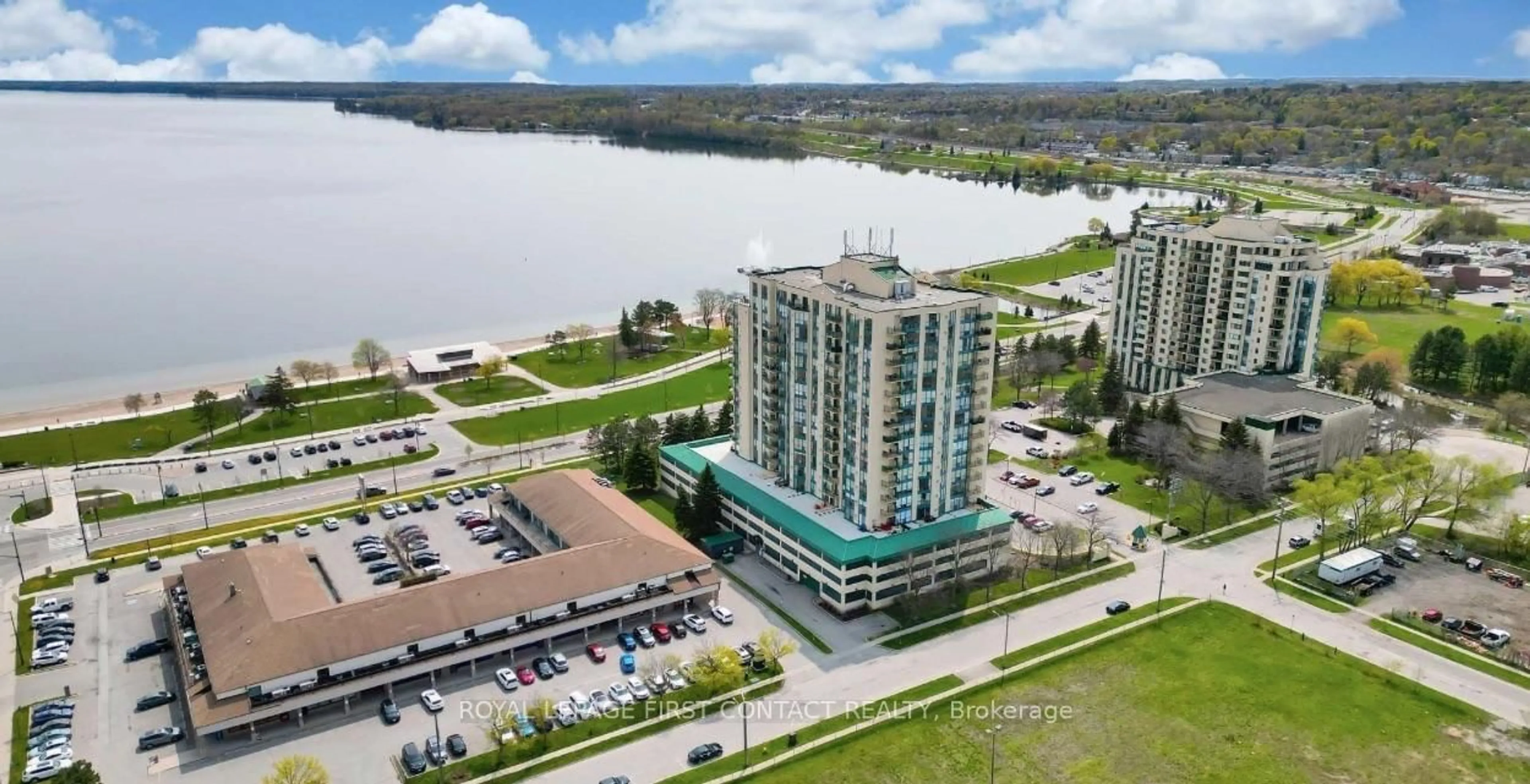A pic from outside/outdoor area/front of a property/back of a property/a pic from drone, water/lake/river/ocean view for 65 Ellen St #709, Barrie Ontario L4N 3A5