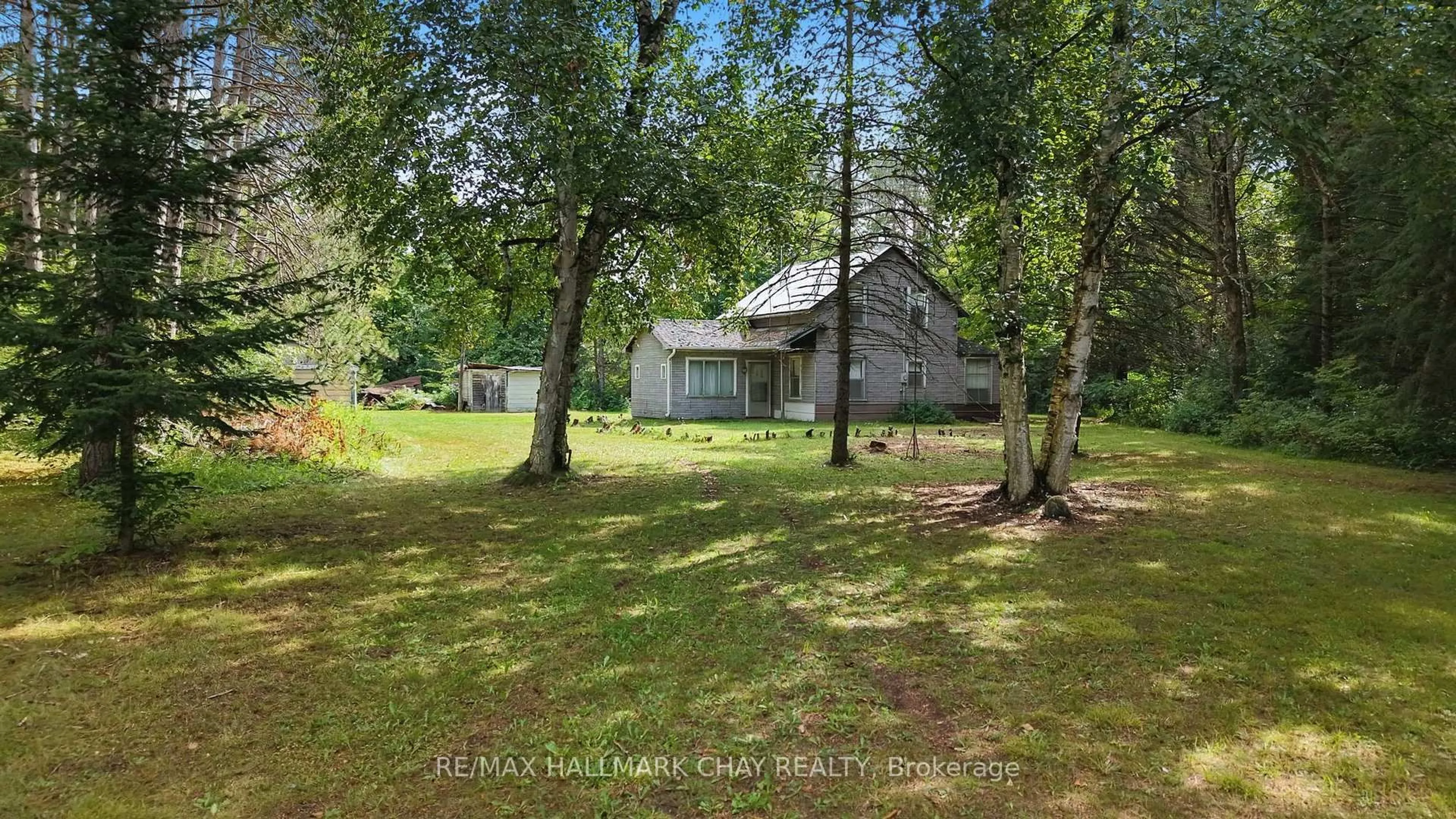 A pic from outside/outdoor area/front of a property/back of a property/a pic from drone, forest/trees view for 1347 Old Second Rd, Springwater Ontario L0L 2K0